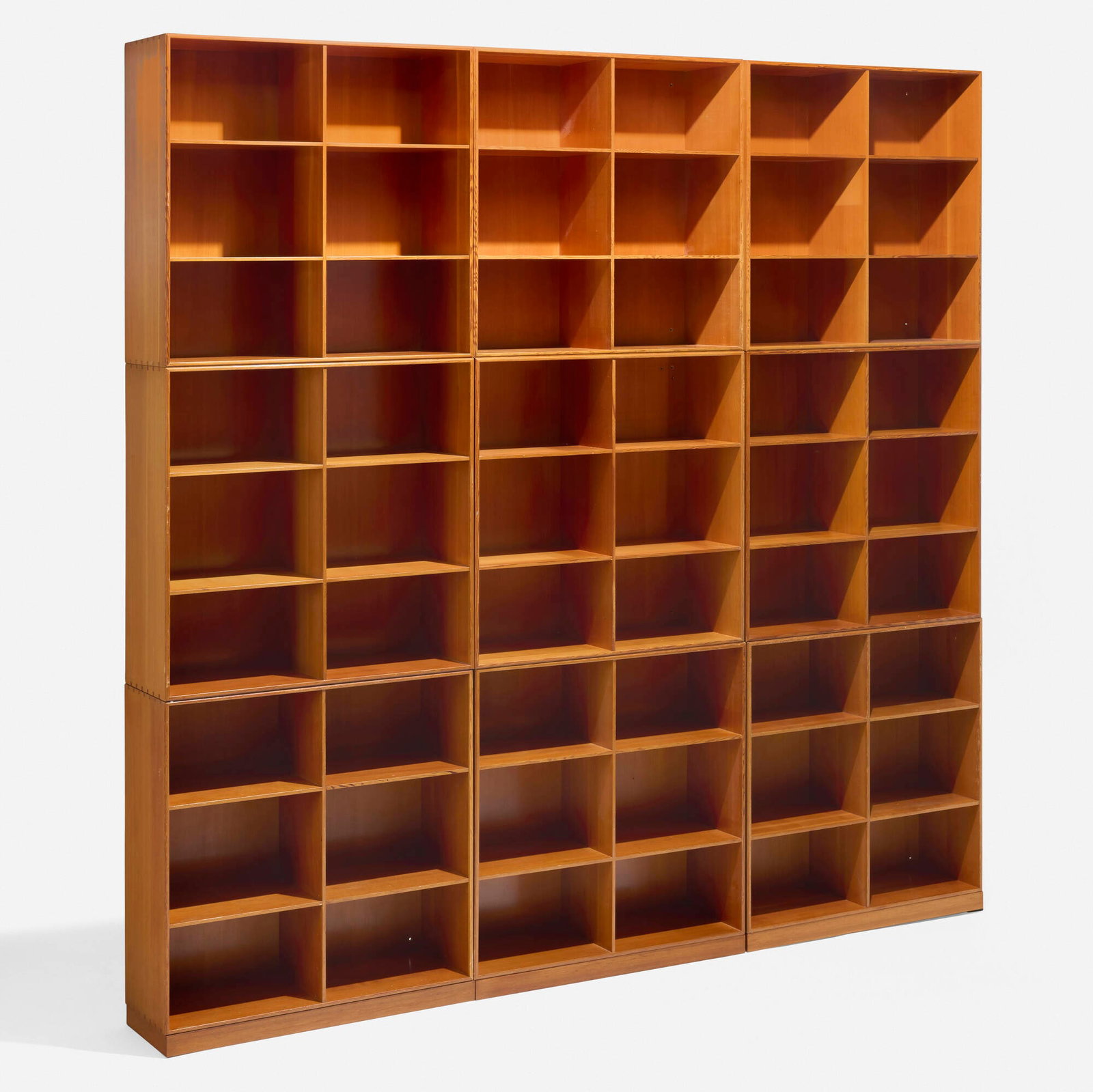 Mogens Koch, Bookcases, set of nine: Mogens Koch Bookcases, set of nine Rud. Rasmussens Snedkerier Denmark, c. 1955 pine overall: 91.75 h x 90 w x 11 d in (233 x 229 x 28 cm) each case: 30 h x 30 w x 11 d in (76 x 76 x 28 cm)