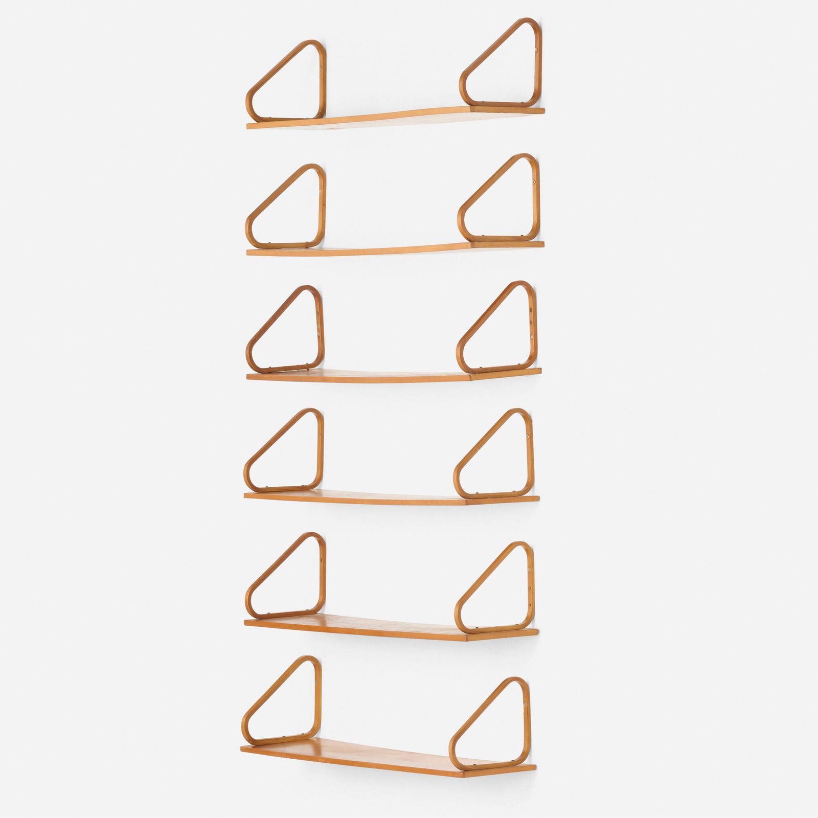 Alvar Aalto, Wall-mounted shelves model 112B, set of six: Alvar Aalto Wall-mounted shelves model 112B, set of six Artek Finland, 1933 laminated birch 9.5 h x 35.5 w x 10.75 d in (24 x 90 x 27 cm) Shelves can be installed in a variety of configurations.