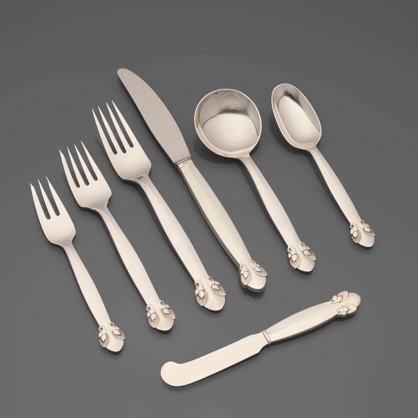 Gundorph Albertus, Bittersweet flatware service: Gundorph Albertus Bittersweet flatware service Georg Jensen Denmark, 1940 / after 1945 sterling silver, stainless steel Complete five piece service for twelve, plus eleven dessert forks and t