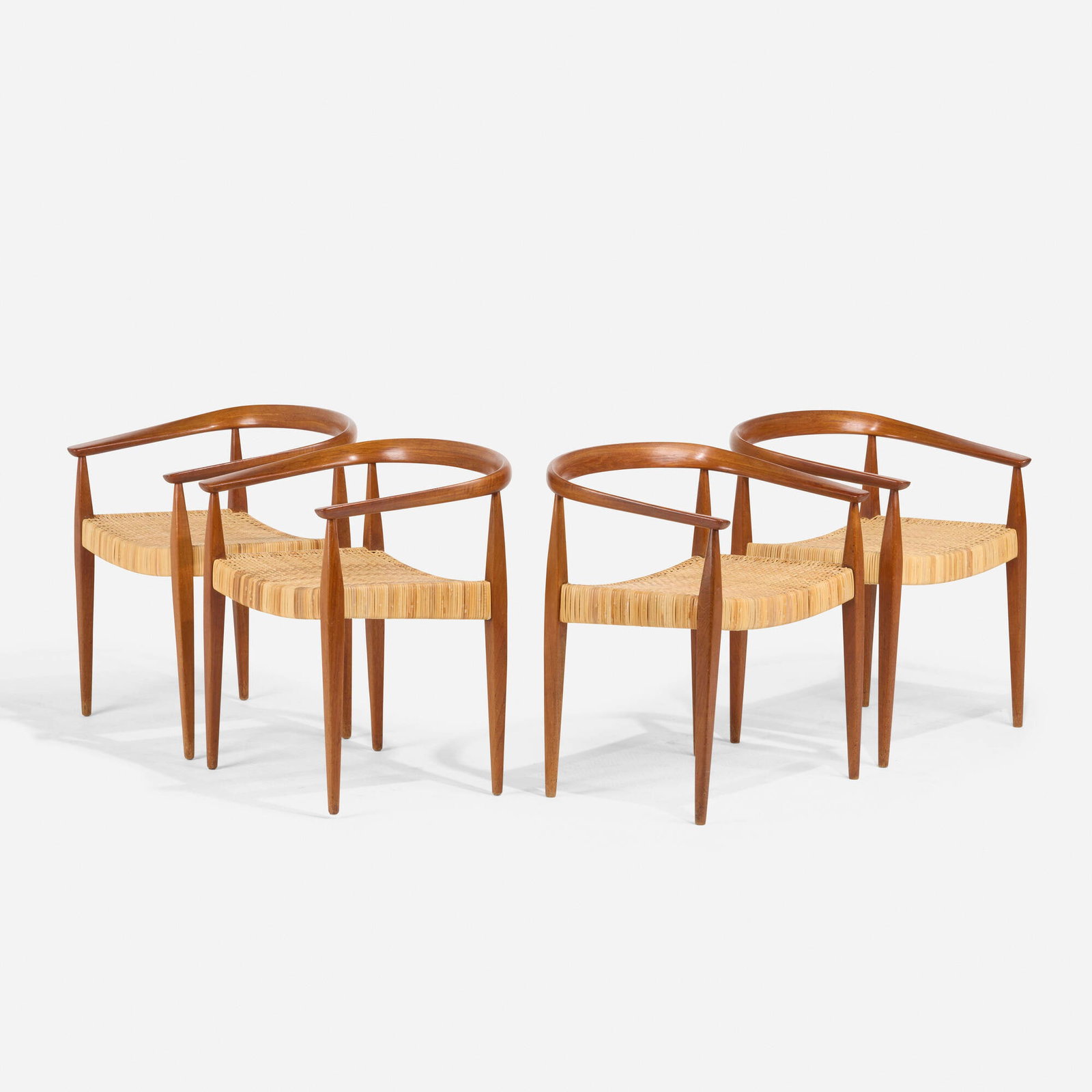 Nanna and Jorgen Ditzel, Armchairs, set of four: Nanna and Jorgen Ditzel Armchairs, set of four Kold Savvaerk Denmark, 1956 teak, cane 27 h x 22.75 w x 19.5 d in (69 x 58 x 50 cm) This work will ship from Lambertville, New J