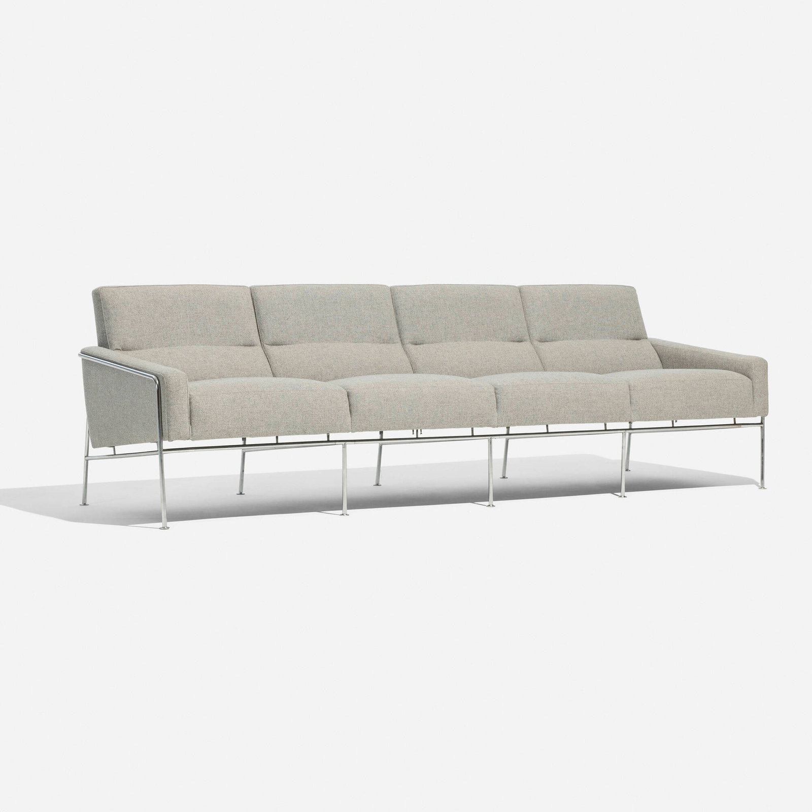 Arne Jacobsen, Sofa, model 3300/4: Arne Jacobsen Sofa, model 3300/4 Fritz Hansen Denmark, 1956 / late 20th century upholstery, stainless steel 28.5 h x 92 w x 29 d in (72 x 234 x 74 cm) Literature: Arne Jacobsen, Thau and Vindum, pg.