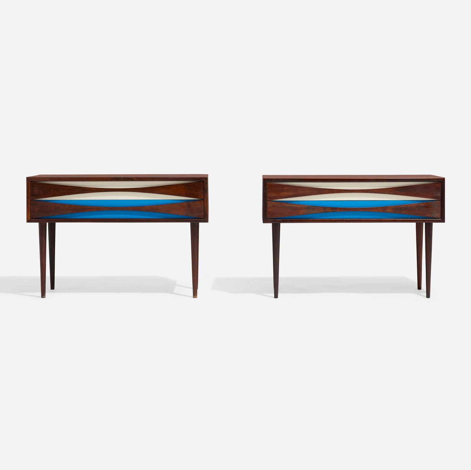 Niels Clausen, Nightstands, pair: Niels Clausen Nightstands, pair N.C. Mobler Denmark, c. 1960 rosewood, lacquered rosewood 21.5 h x 31.5 w x 12.5 d in (55 x 80 x 32 cm) Nightstands each feature two drawers. This work will ship from