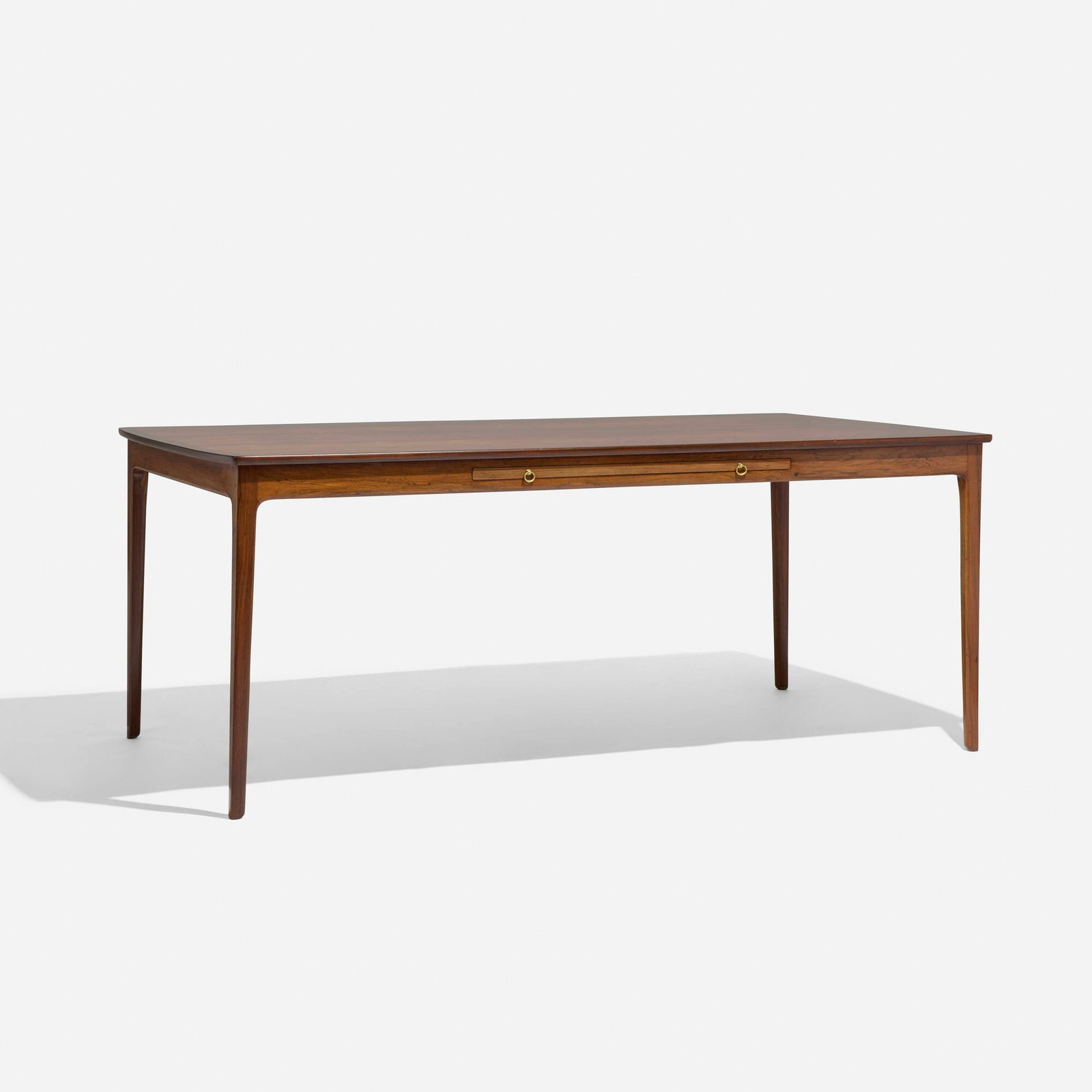 Ole Wanscher, Desk: Ole Wanscher Desk A.J. Iversen Snedkermester Denmark, c. 1960 rosewood, brass 29.125 h x 73 w x 36 d in (74 x 185 x 91 cm) Desk features a 22-inch pullout extension. Th