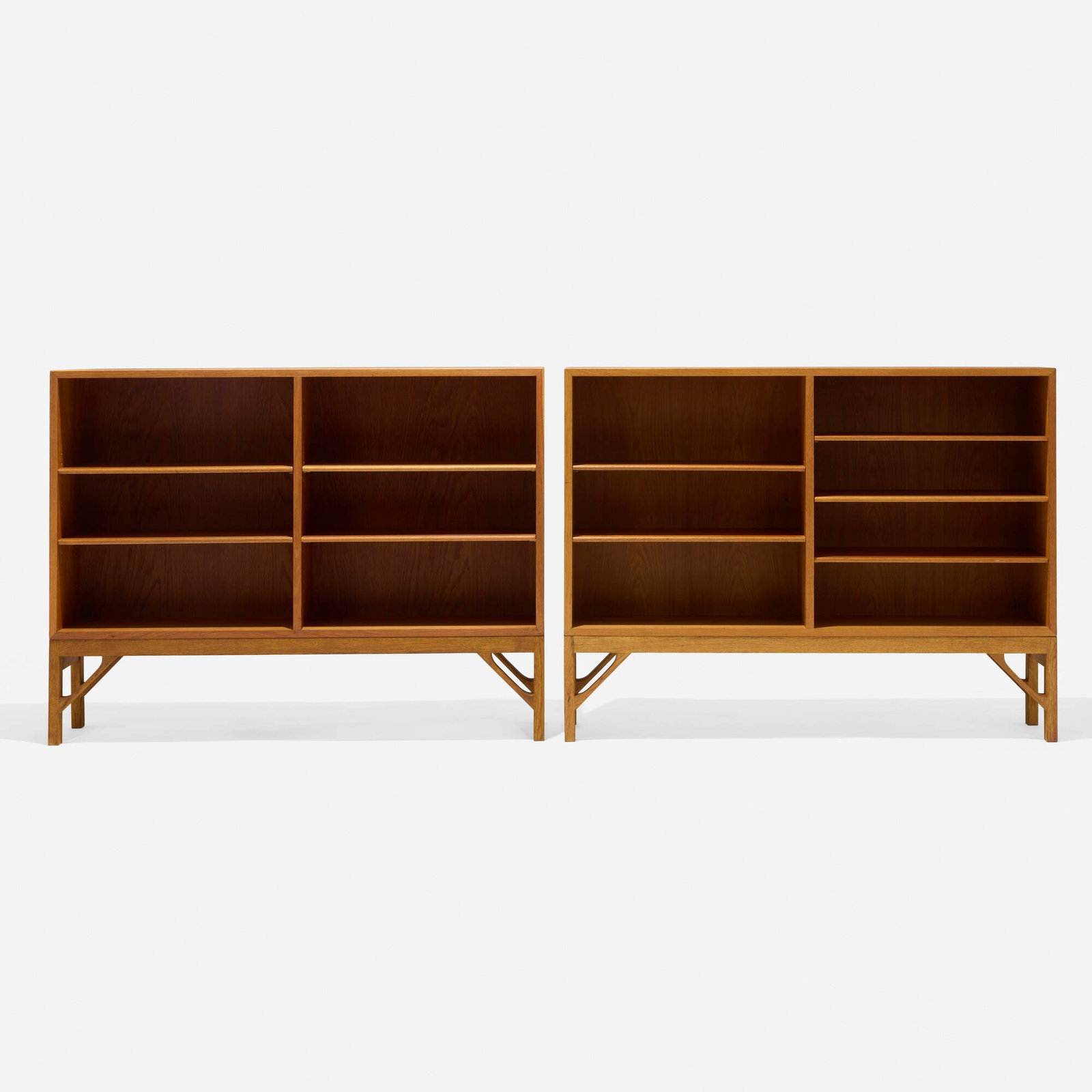 Borge Mogensen, Bookcases, pair: Borge Mogensen Bookcases, pair C.M. Madsens Fabrikker Denmark, c. 1945 oak veneer, oak 36.375 h x 48.125 w x 10.25 d in (92 x 122 x 26 cm) Bookcases feature a total of nine adjustable shelves. Faint