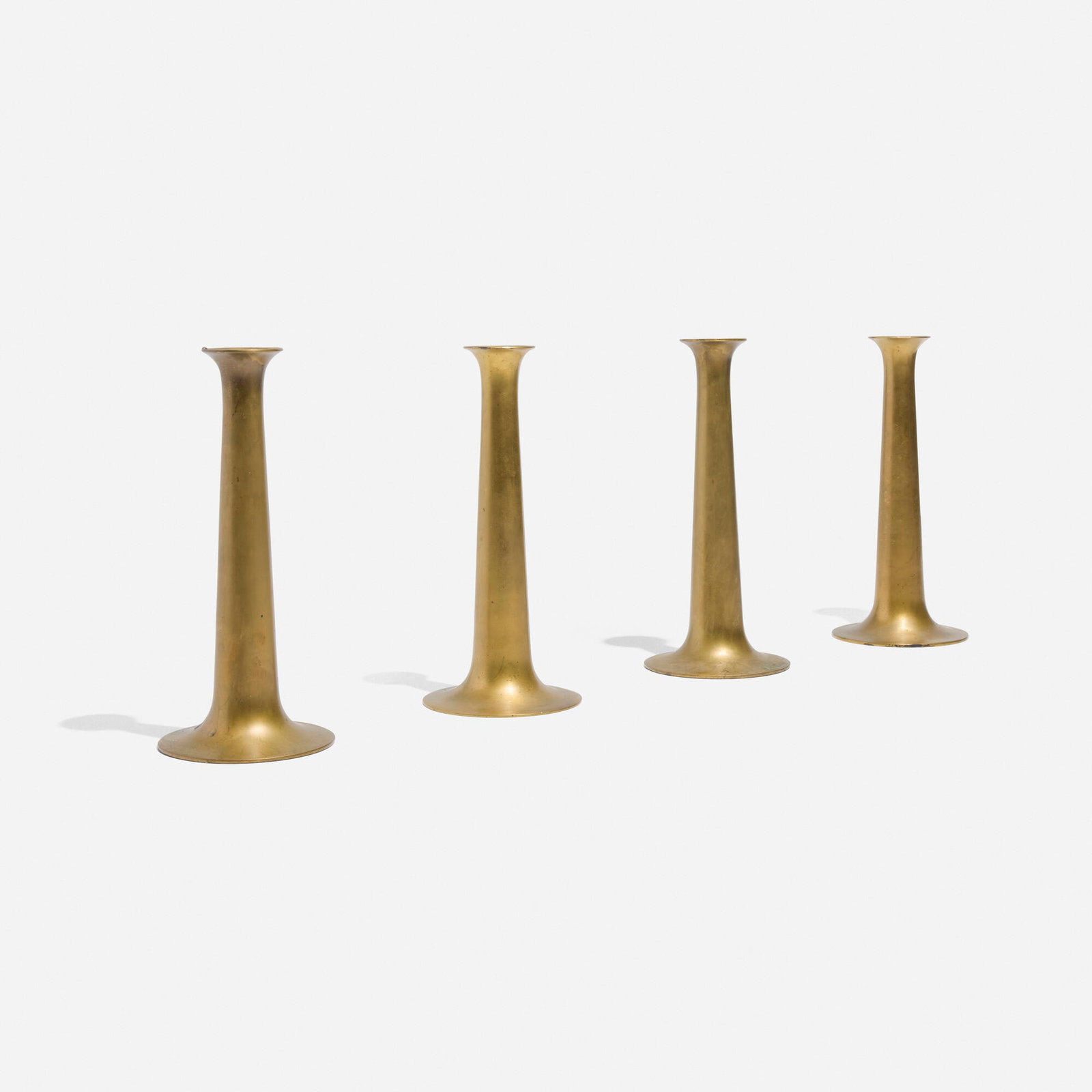 Hans Bolling, Candlesticks, set of four: Hans Bolling Candlesticks, set of four Torben Orskov & Co. Denmark, c. 1965 brass 8.625 h x 3.875 dia in (22 x 10 cm) Cast manufacturer's mark to underside of each example 'Torben Orskov &