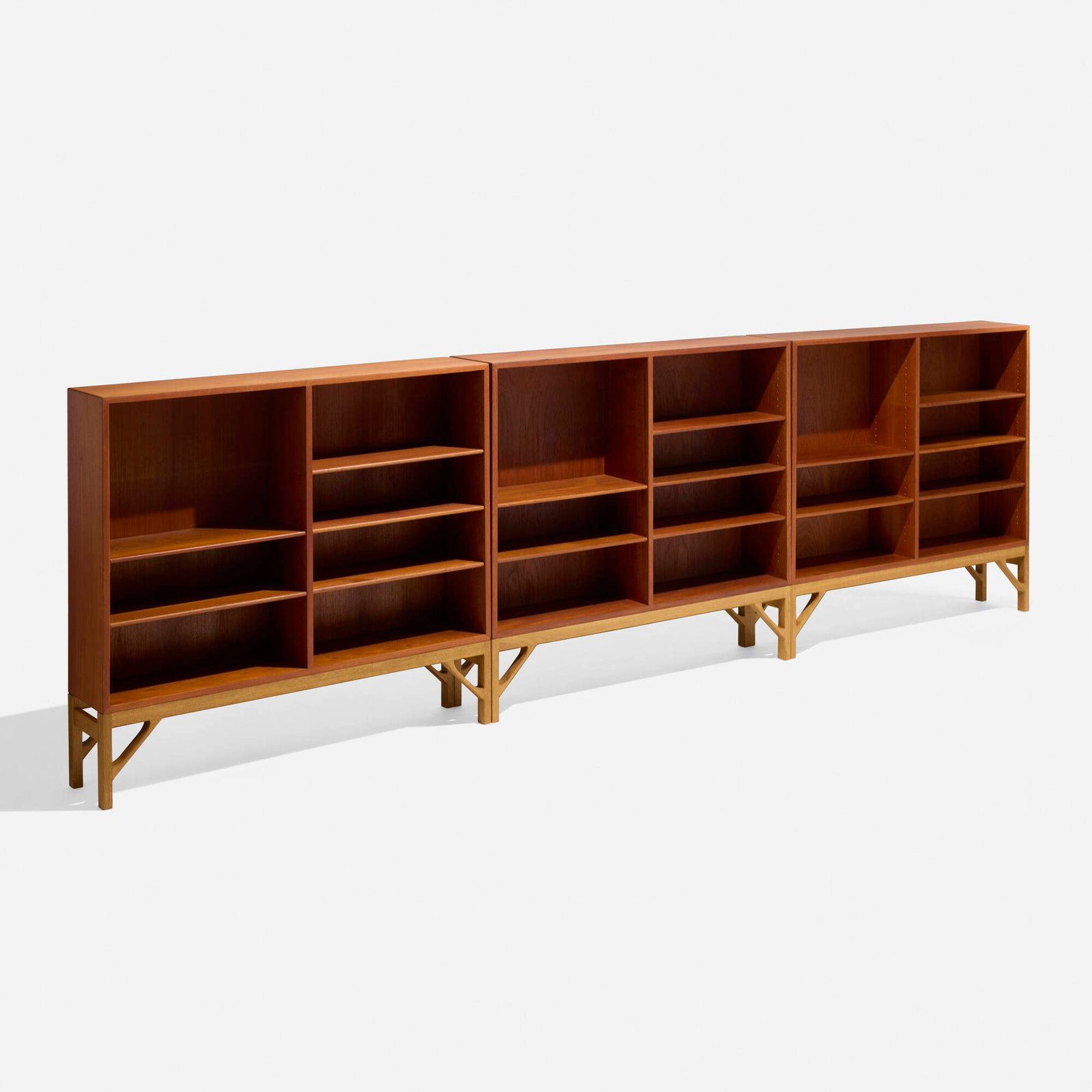 Borge Mogensen, Bookshelves, set of three: Borge Mogensen Bookshelves, set of three C.M. Madsens Fabrikker for FDB Mobler Denmark, c. 1945 teak veneer, oak 44.375 h x 48 w x 10.25 d in (113 x 122 x 26 cm) Bookcases feature a total of fifteen