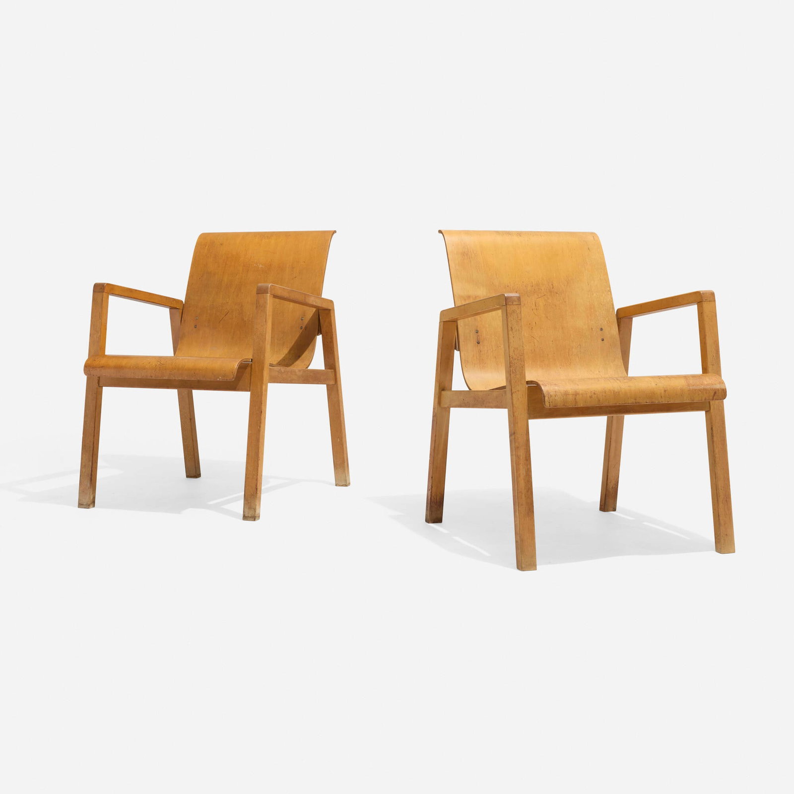 Alvar Aalto, Hallway armchairs model 403, pair: Alvar Aalto Hallway armchairs model 403, pair Finmar Finland, 1932 birch, birch plywood 29 h x 21 w x 25.5 d in (74 x 53 x 65 cm) Provenance: Collection of architect Walter Frederick Martens | Thence