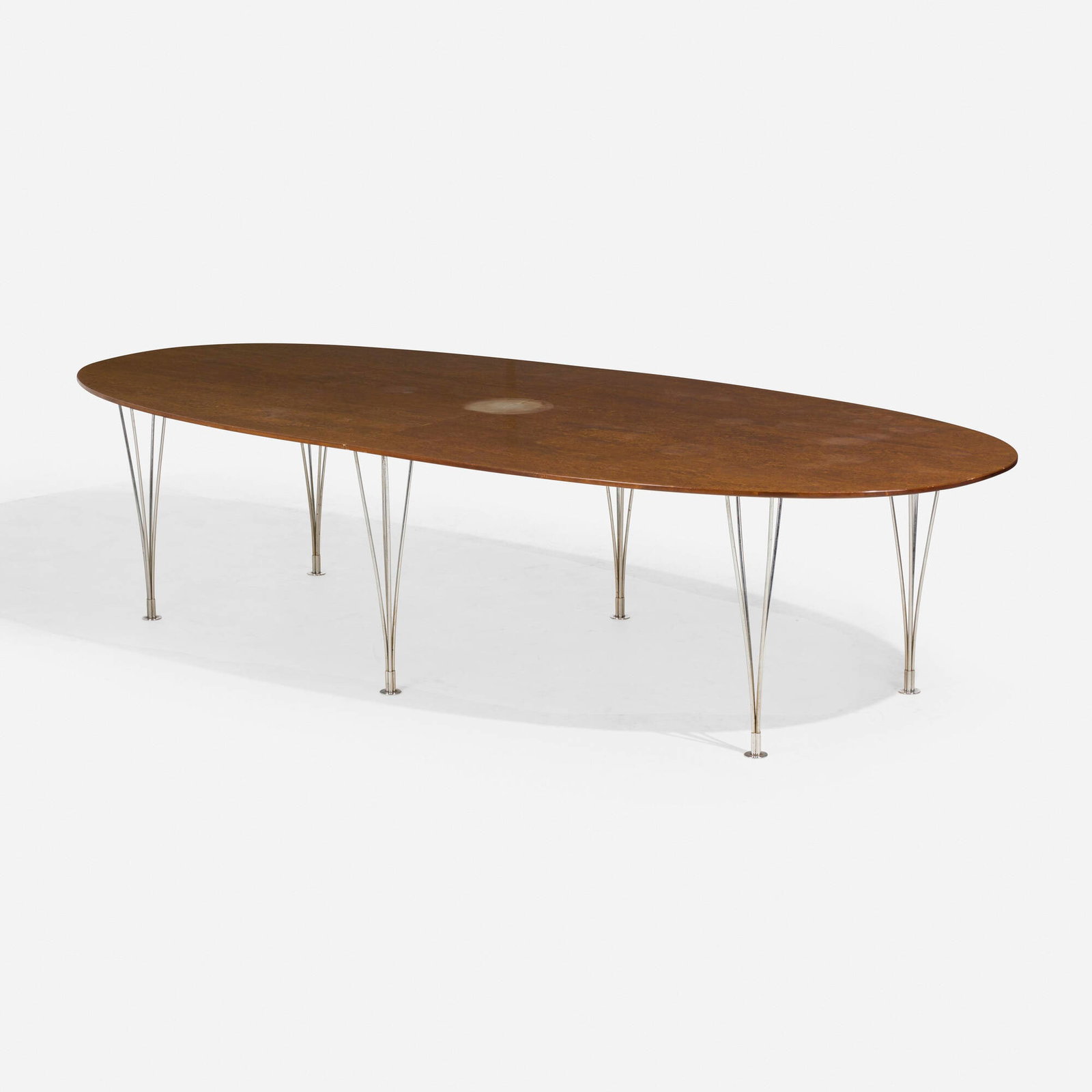 Piet Hein and Bruno Mathsson, Super Ellipse table: Piet Hein and Bruno Mathsson Super Ellipse table Bruno Mathsson International Denmark/Sweden, 1968 maple burl, chrome-plated steel 27.5 h x 118 w x 51.25 d in (70 x 300 x 130 cm) Decal