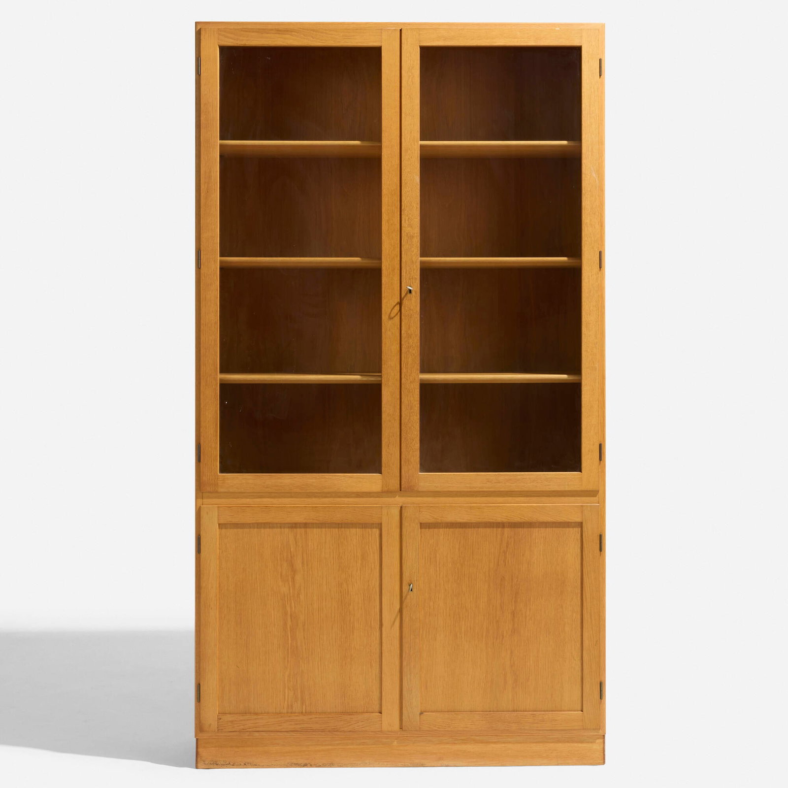 Borge Mogensen, Tall cabinet: Borge Mogensen Tall cabinet Denmark, c. 1960 oak, glass 71.625 h x 39.375 w x 12.75 d in (182 x 100 x 32 cm) Cabinet features four doors concealing five adjustable shelves.