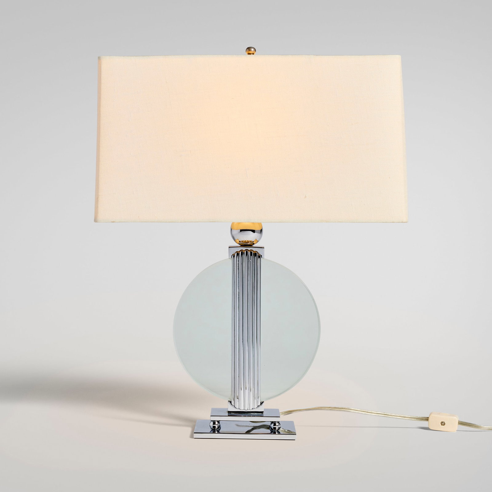 Walter von Nessen, Table lamp: Walter von Nessen Table lamp Nessen Studio USA, c. 1930 stainless steel, glass, fabric 17.5 h x 13.5 w x 5 d in (44 x 34 x 13 cm) Impressed manufacturer's mark to underside 'Nessen Studio