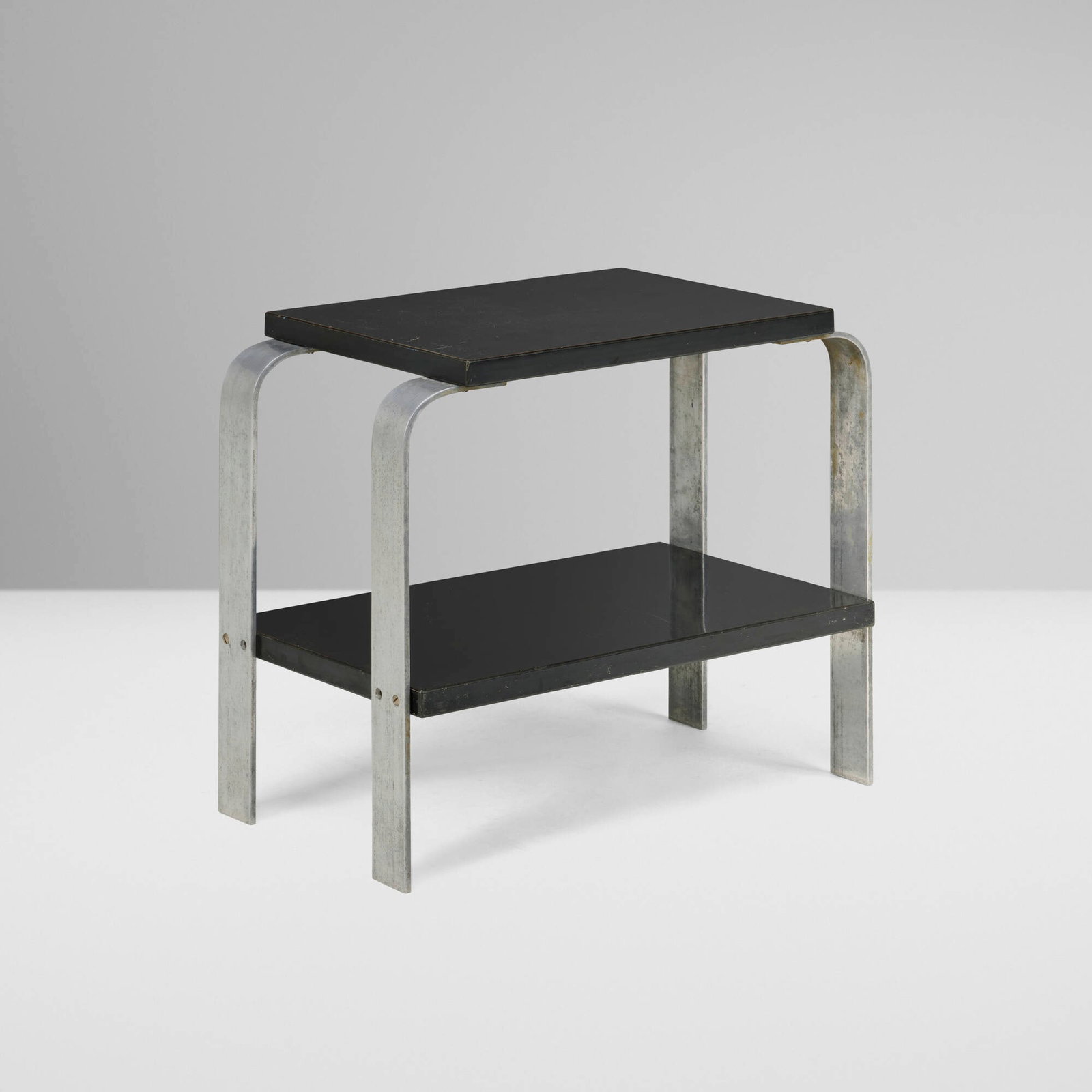 Donald Deskey, Occasional table: Donald Deskey Occasional table Deskey-Vollmer, Inc. USA, c. 1928 lacquered wood, aluminum 18.25 h x 20 w x 12 d in (46 x 51 x 30 cm) Metal label to underside 'Skyscraper Furniture Frankl