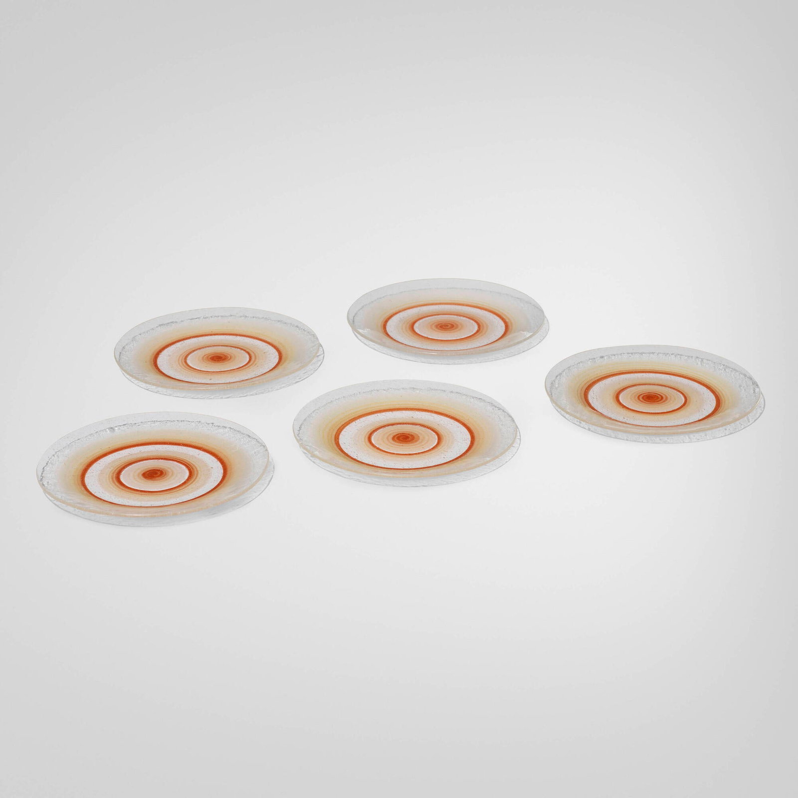 Maurice Heaton, Plates, set of five: Maurice Heaton Plates, set of five USA, c. 1930 blown glass with enamel 0.75 h x 7.75 dia in (2 x 20 cm) Etched signature to reverse of each example 'MH'. Provenance: 20th Century Limited Passenger
