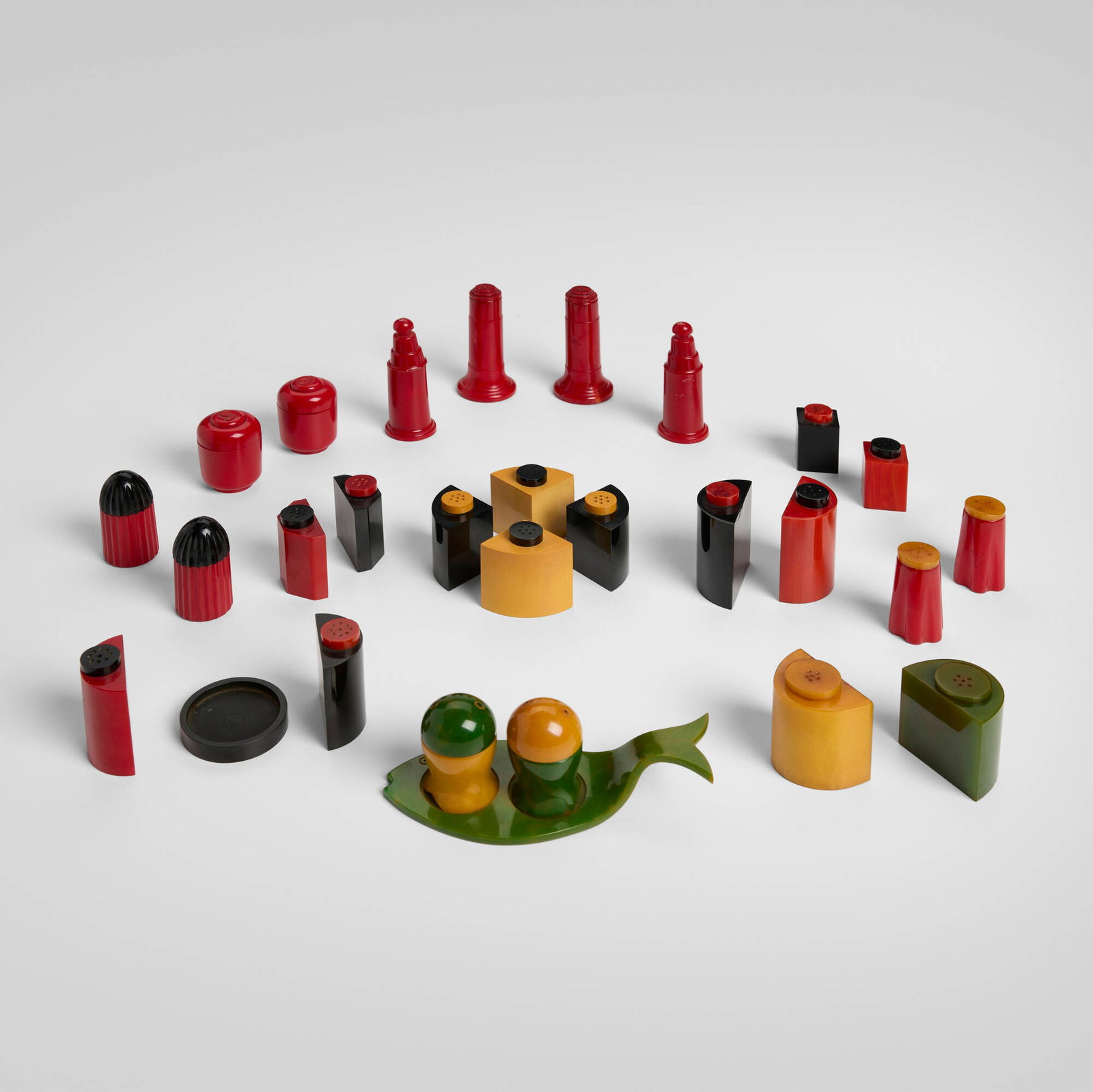 Vintage, Collection of salt and peppers shakers: Vintage Collection of salt and peppers shakers c. 1940-1955 Bakelite, plastic largest: 3.625 h x 1.5 dia in (9 x 4 cm) smallest: 1.75 h x 0.875 w x 0.875 d in (4 x 2 x 2 cm) Collection is comprised