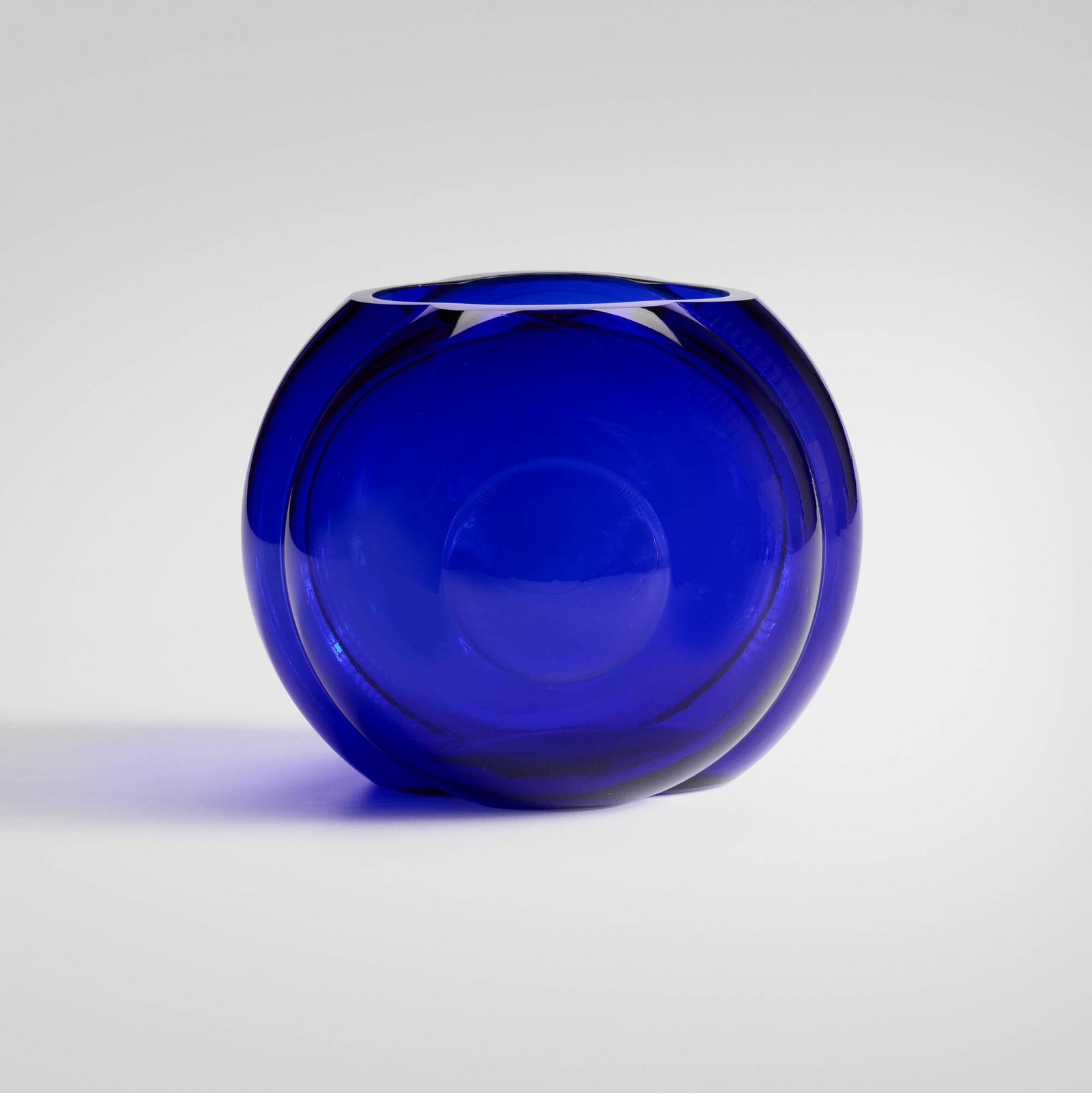 George Sakier, Bullseye vase: George Sakier Bullseye vase Fostoria Glass Company USA, c. 1933 mold-blown glass 5.5 h x 7 dia in (14 x 18 cm) An example of this form is held in the collection of the Birmingham Museum of Art,