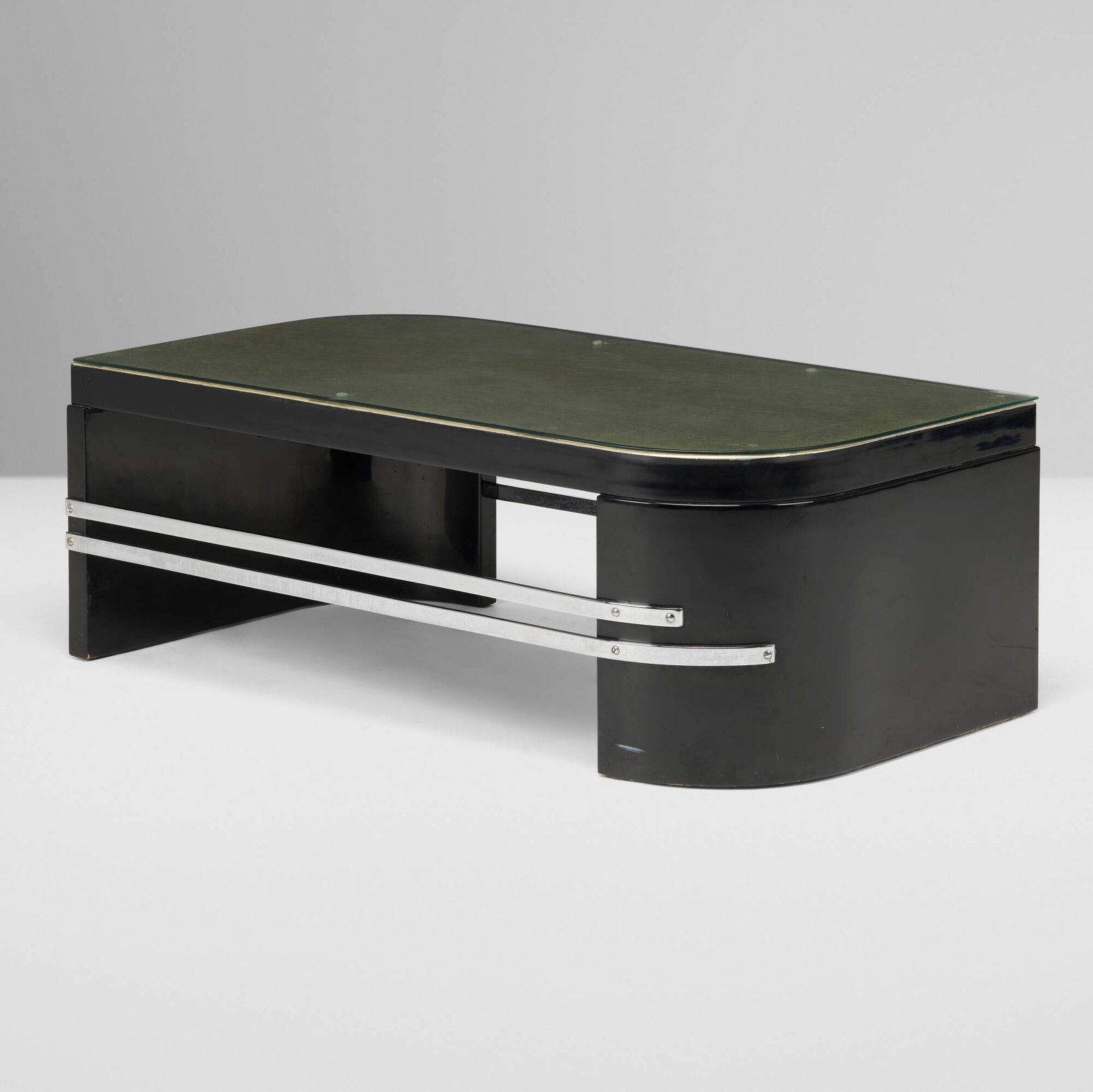 Art Deco, Coffee table: Art Deco Coffee table c. 1935 lacquered wood, glass, stainless steel 17.75 h x 50 w x 26.5 d in (45 x 127 x 67 cm) This work will ship from Lambertville, New Jersey.