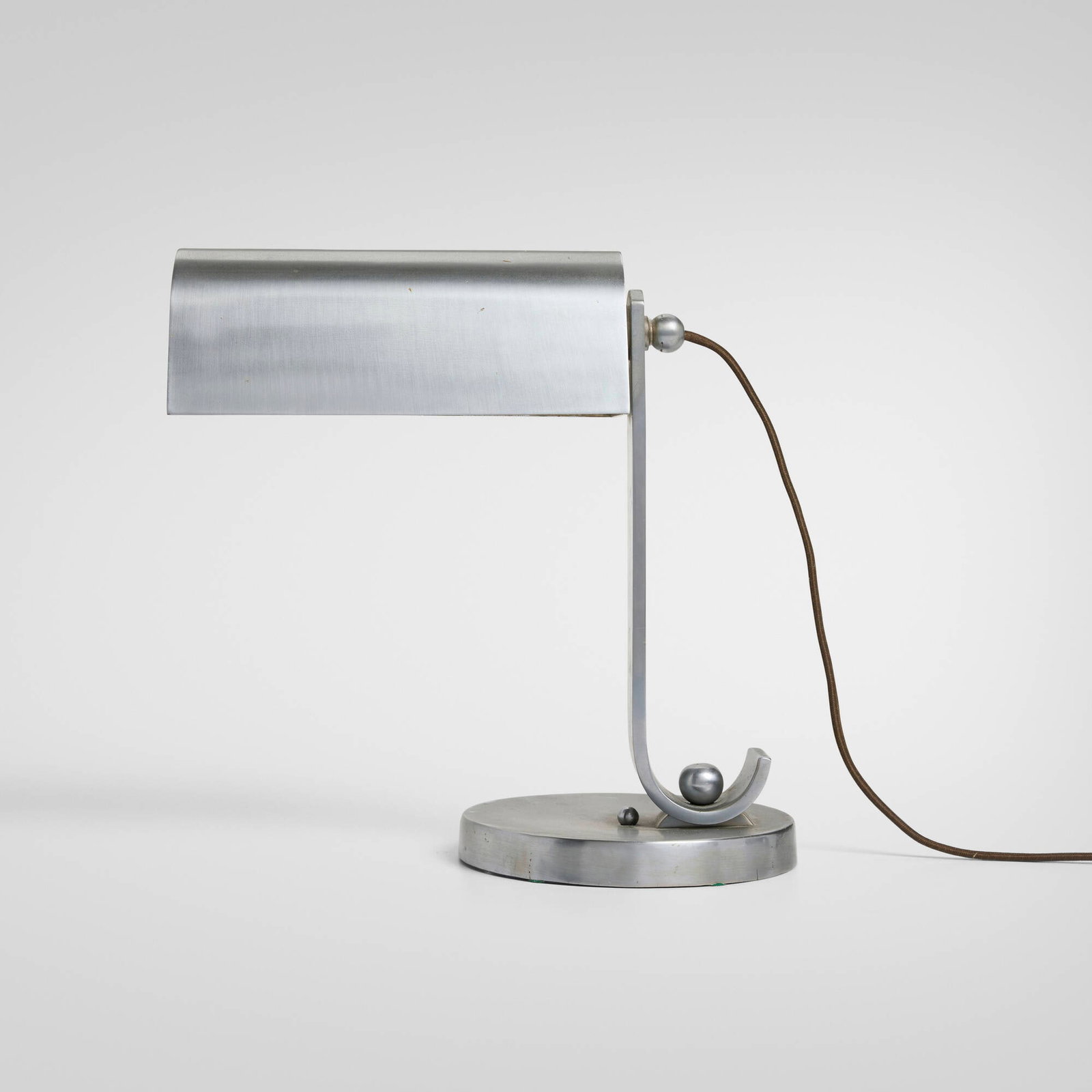 Donald Deskey, attribution, Table lamp: Donald Deskey, attribution Table lamp USA, c. 1935 matte chrome-plated brass 10.875 h x 10.75 w x 5.875 d in (28 x 27 x 15 cm) Provenance: Private Collection This work will ship from Chicago,