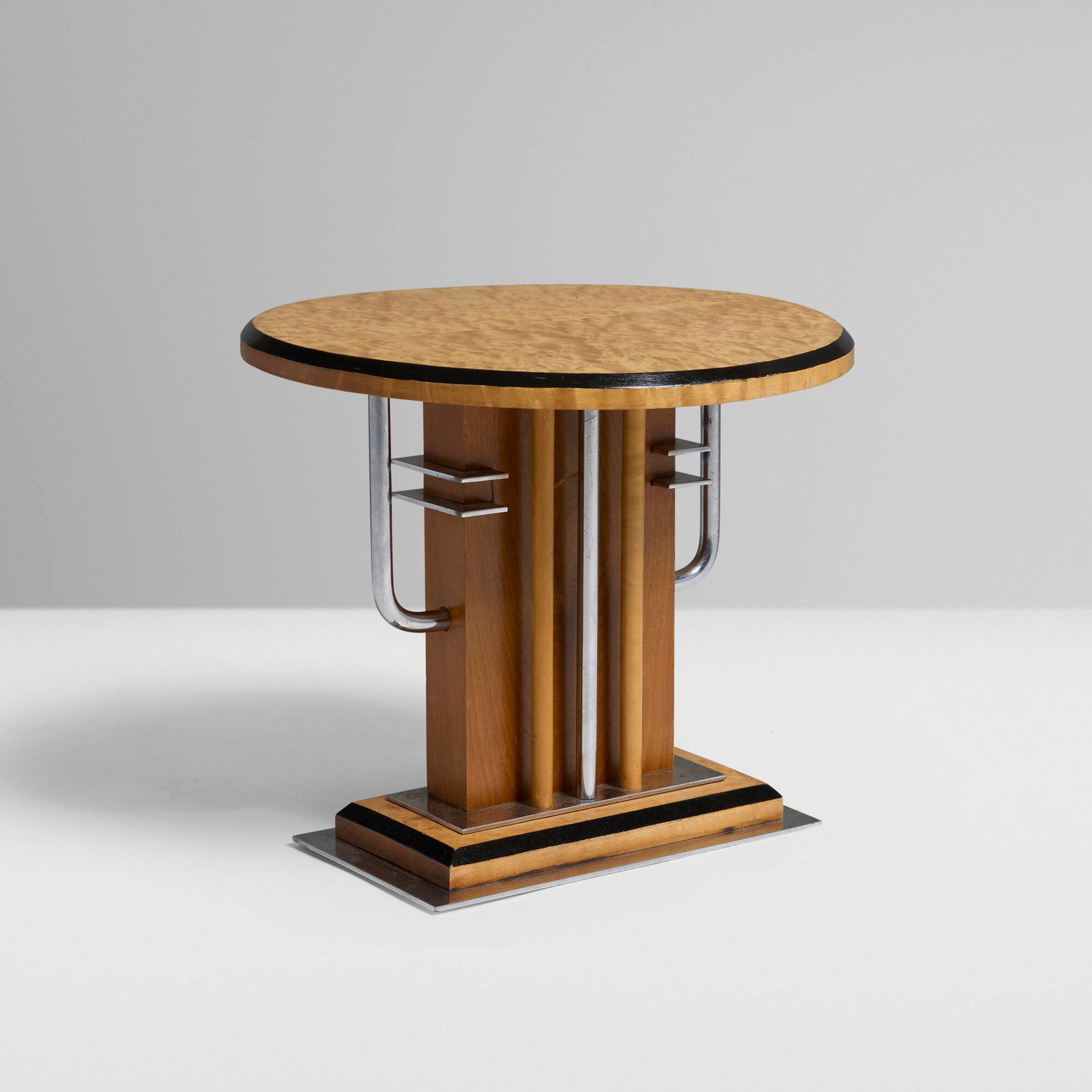 Hugh Lyons & Co., Art Deco pedestal: Hugh Lyons & Co. Art Deco pedestal USA, c. 1930 lacquered bird's-eye maple, elm, chrome-plated steel 12.25 h x 14 dia in (31 x 36 cm) Partial decal manufacturer's label to underside 'Hugh
