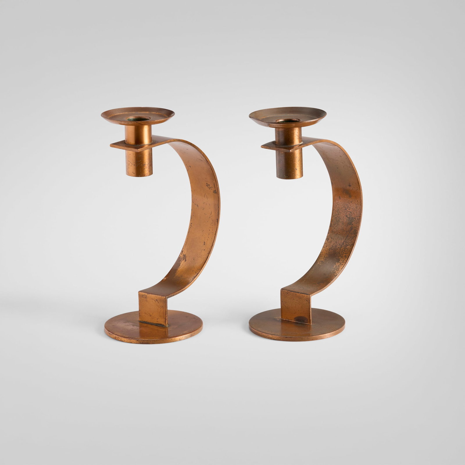 Albert Reimann, Crescent candlesticks model 21008, pair: Albert Reimann Crescent candlesticks model 21008, pair Chase Brass & Copper Co. Germany, 1933 copper-plated brass 8.5 h x 5.625 w x 3.75 d in (22 x 14 x 10 cm) 8.375 h x 5.625 w x 3.75 d in (21 x 14