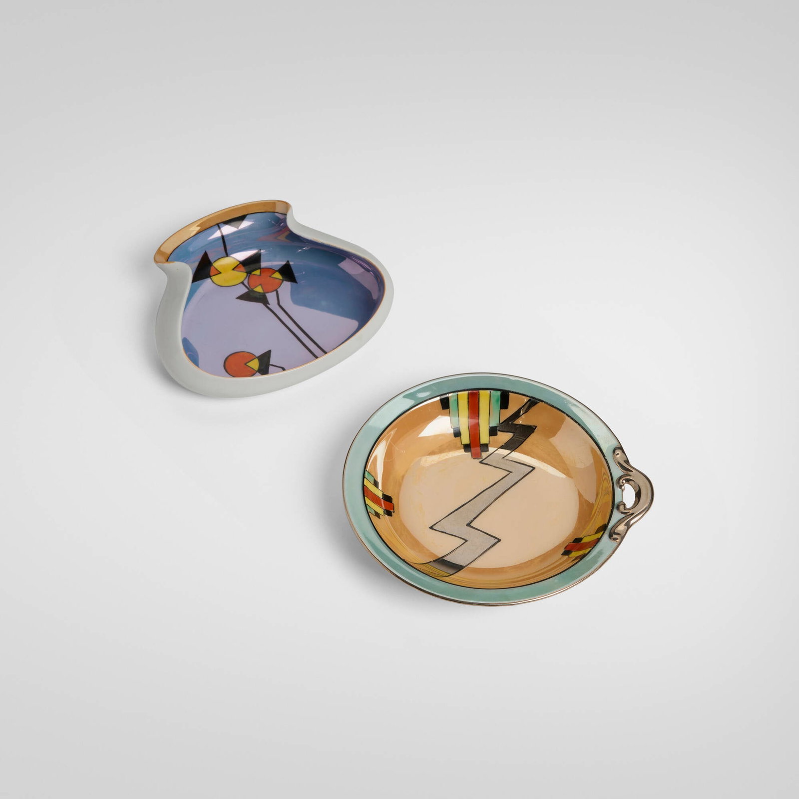 Japanese, Ashtrays with geometric patterns, set of two: Japanese Ashtrays with geometric patterns, set of two c. 1940 glazed and hand-painted porcelain 1.125 h x 6 w x 5.5 d in (3 x 15 x 14 cm) 1.5 h x 4.625 w x 5.25 d in (4 x 12 x 13 cm) Set is comprised