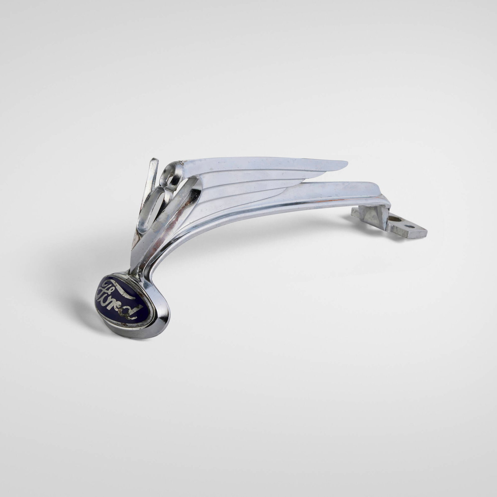 Ford Motor Company, 'V8' hood ornament: Ford Motor Company 'V8' hood ornament USA, c. 1936 chrome-plated and enameled brass 3.75 h x 2.125 w x 8.5 d in (10 x 5 x 22 cm) Impressed manufacturer's mark to underside '48-8215 1'.