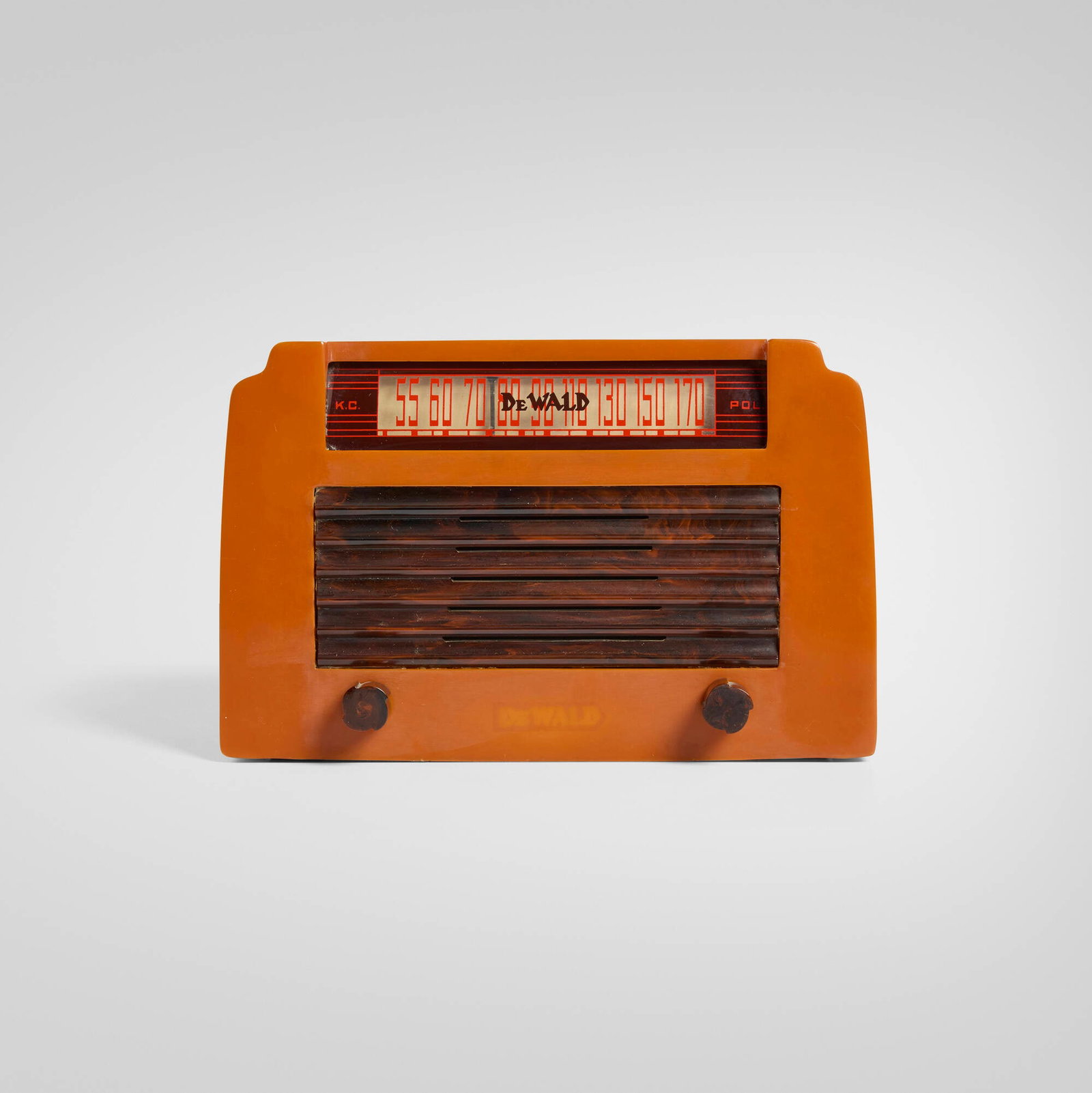 DeWald Radio Manufacturing Corporation, Step-Top radio, model A-502: DeWald Radio Manufacturing Corporation Step-Top radio, model A-502 USA, 1946 Catalin, plastic 6.25 h x 9.75 w x 6.375 d in (16 x 25 x 16 cm) Screen-printed manufacturer's mark to display