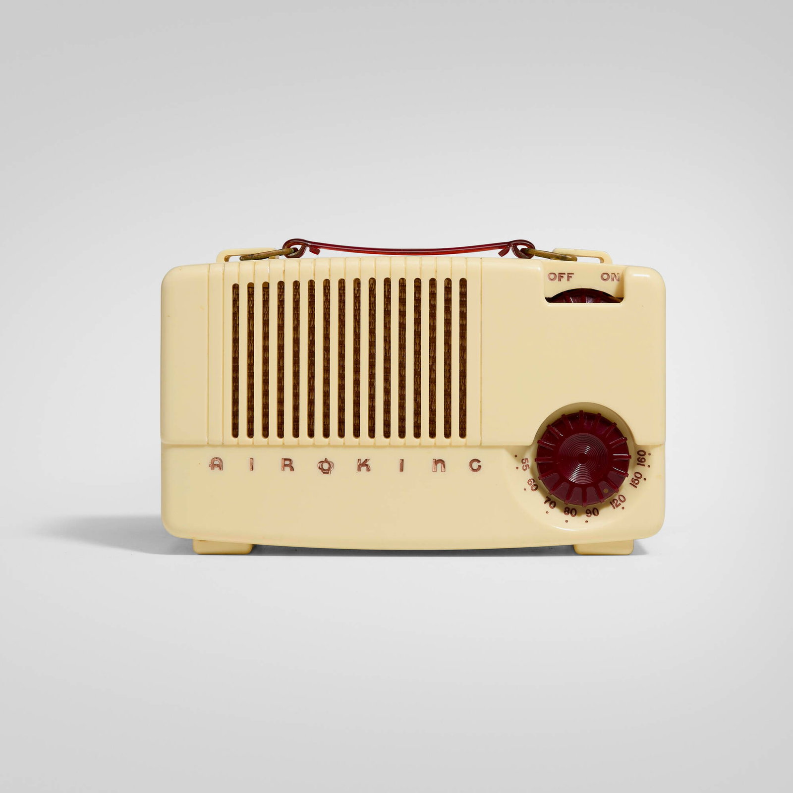 Air King Products Co., Inc., Radio, model A-520: Air King Products Co., Inc. Radio, model A-520 USA, 1948 plastic, brass 5.375 h x 8.25 w x 3.5 d in (14 x 21 x 9 cm) Paper manufacturer's label to interior 'Radio Manufacturer's
