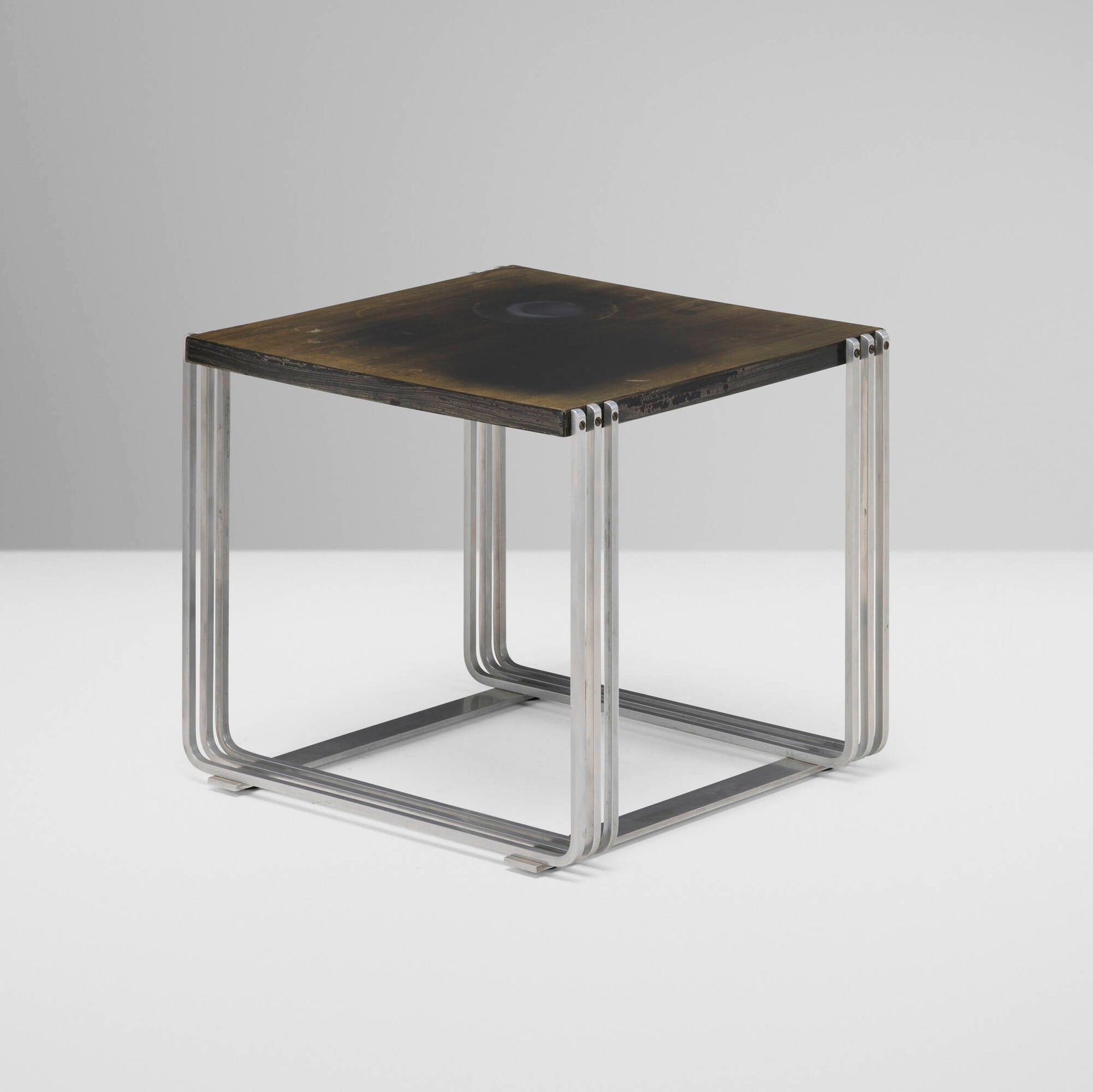 Gilbert Rohde, Occasional table: Gilbert Rohde Occasional table USA, c. 1928 lacquered Micarta, stainless steel 17 h x 18.75 w x 18 d in (43 x 48 x 46 cm) A related example is held in the collection of the Yale University Art