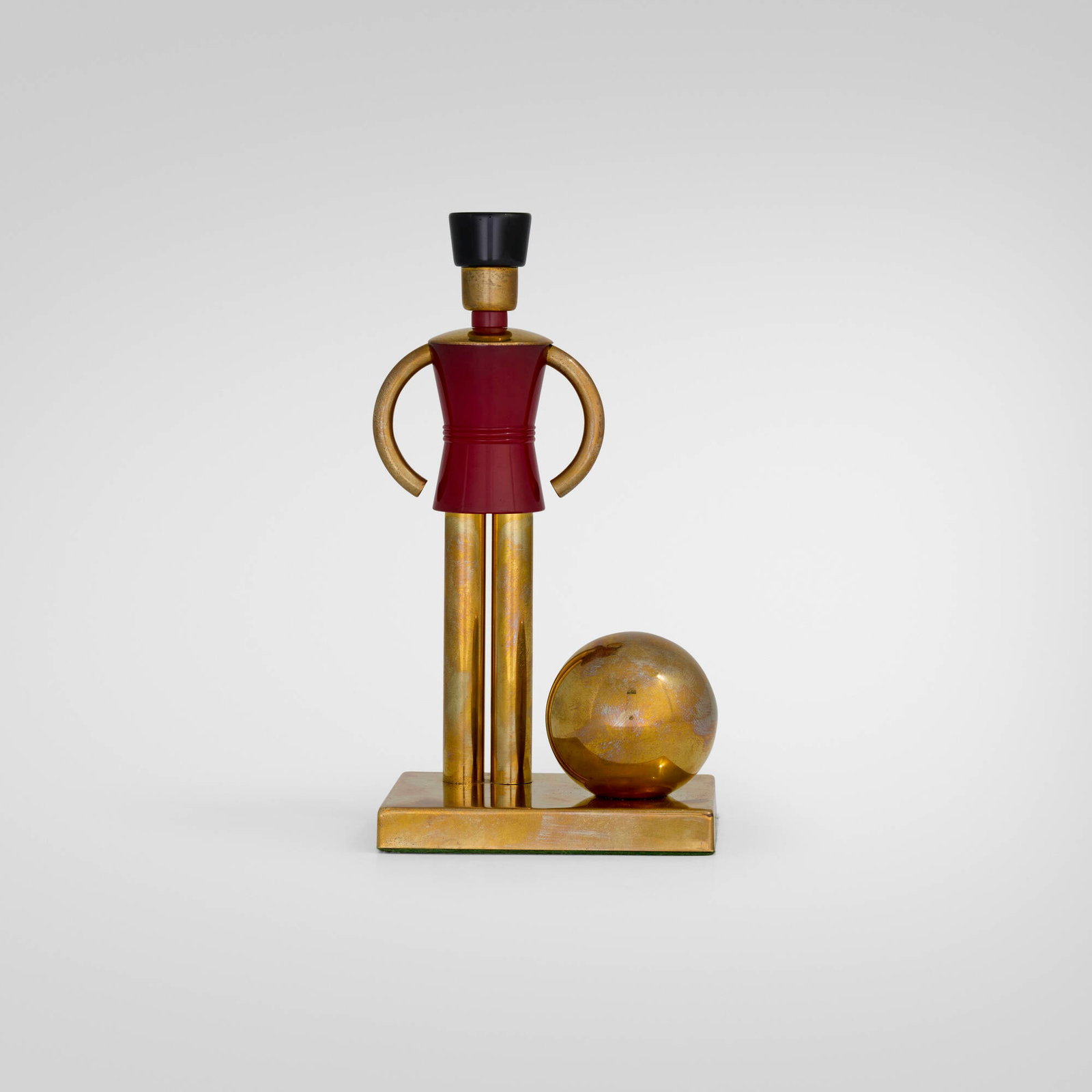 Chase Brass & Copper Co., Sentinel bookend, model 17109: Chase Brass & Copper Co. Sentinel bookend, model 17109 USA, c. 1942 brass, plastic 7.25 h x 4 w x 3 d in (18 x 10 x 8 cm) Impressed manufacturer's mark to top of base 'Chase USA' with