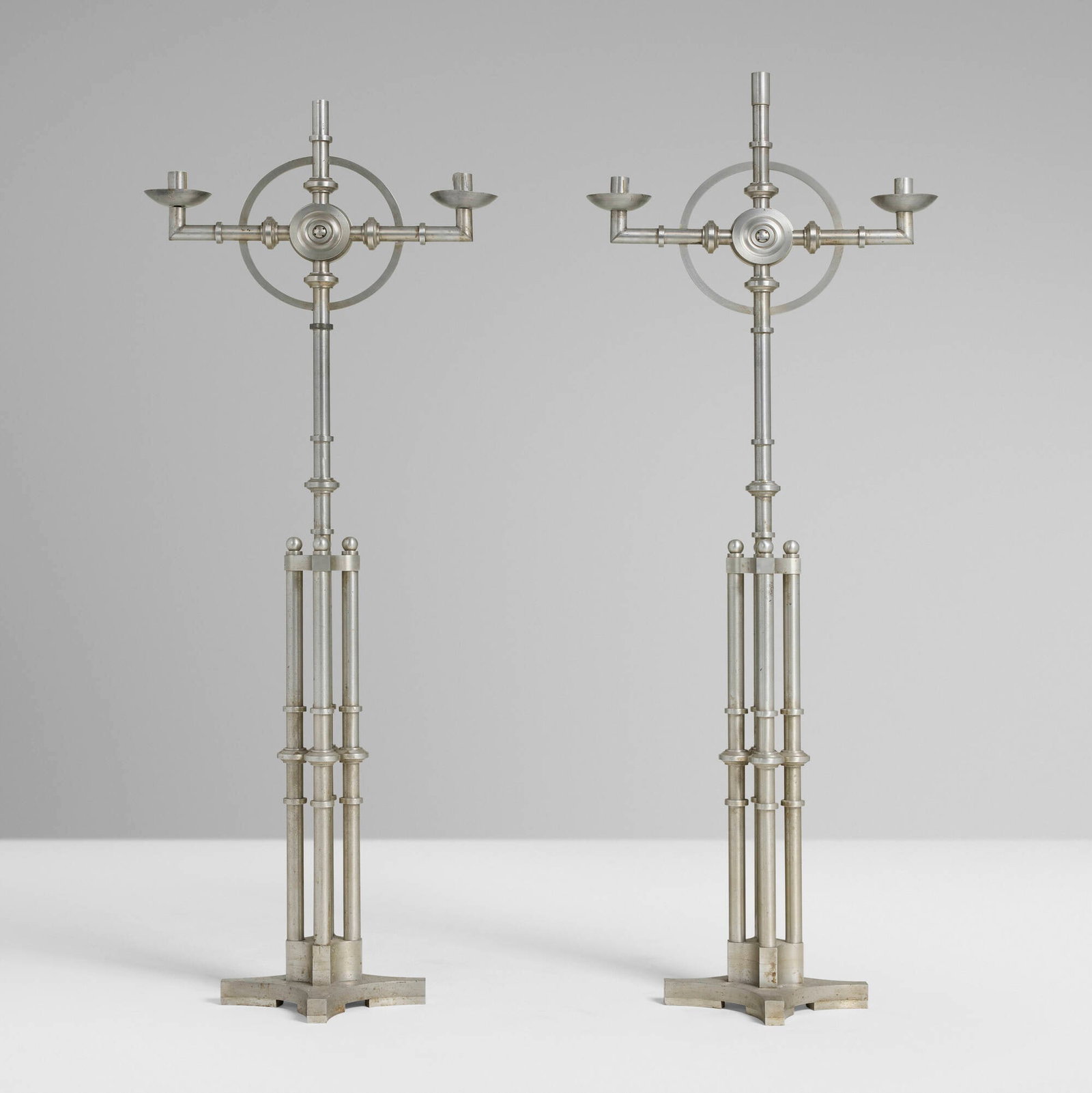Machine Age, Floor candelabra, pair: Machine Age Floor candelabra, pair USA, c. 1935 aluminum 58.25 h x 12 w x 12 d in (148 x 30 x 30 cm) 56.25 h x 12 w x 12 d in (143 x 30 x 30 cm) This work will ship from Chicago, Illinois.