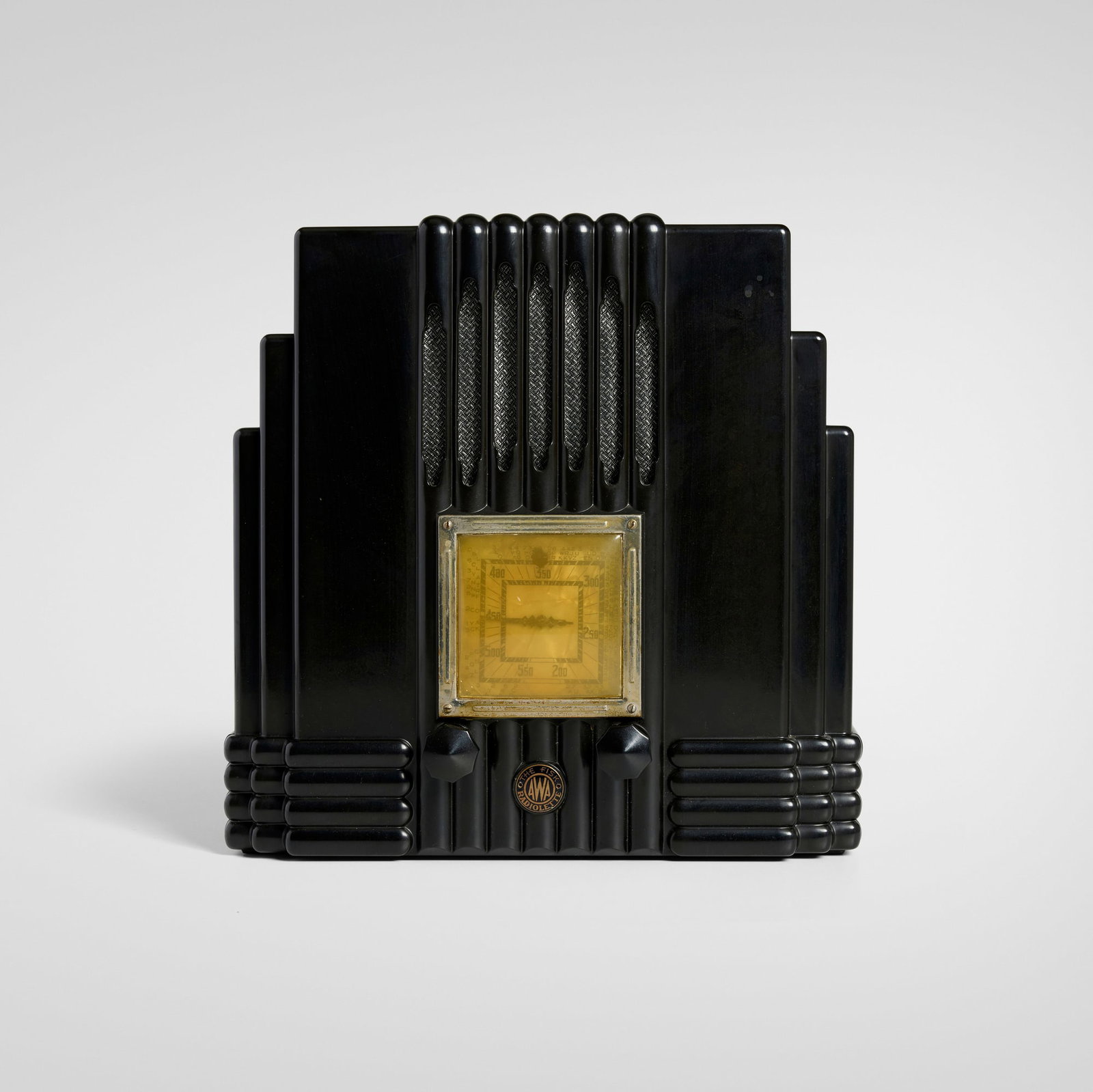 Amalgamated Wireless (AWA), Fisk Radiolette, model R29: Amalgamated Wireless (AWA) Fisk Radiolette, model R29 Australia / United Kingdom, c. 1935 Bakelite, plastic, chrome-plated brass, fabric 10.875 h x 11 w x 7 d in (28 x 28 x 18 cm) An example of this