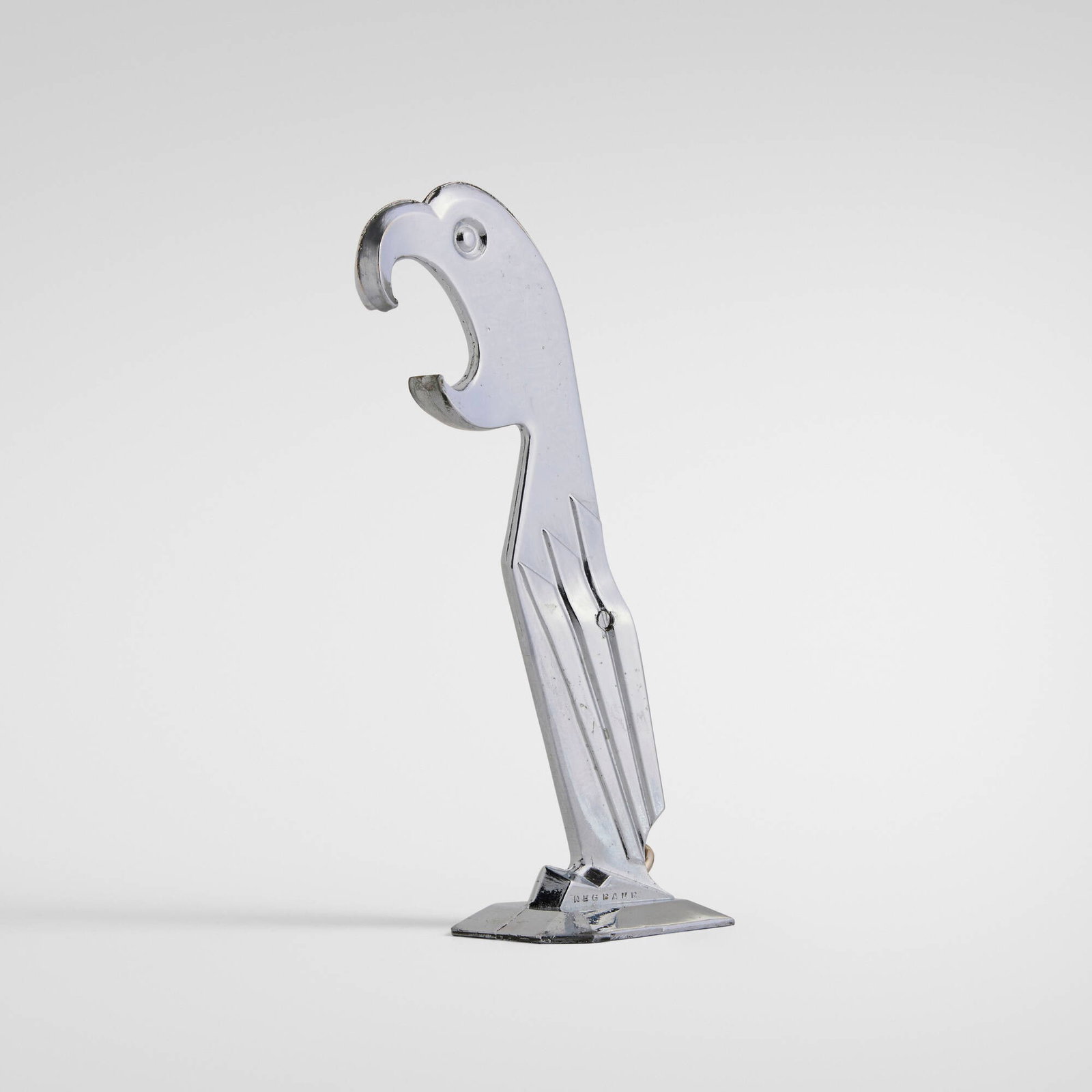 Manuel Avillar, Polly bottle opener and ice cracker: Manuel Avillar Polly bottle opener and ice cracker H. Negbaur & Co. USA, 1929 chrome-plated metal 5.25 h x 1.5 w x 2 d in (13 x 4 x 5 cm) Cast manufacturer's mark to base 'Negbaur'.
