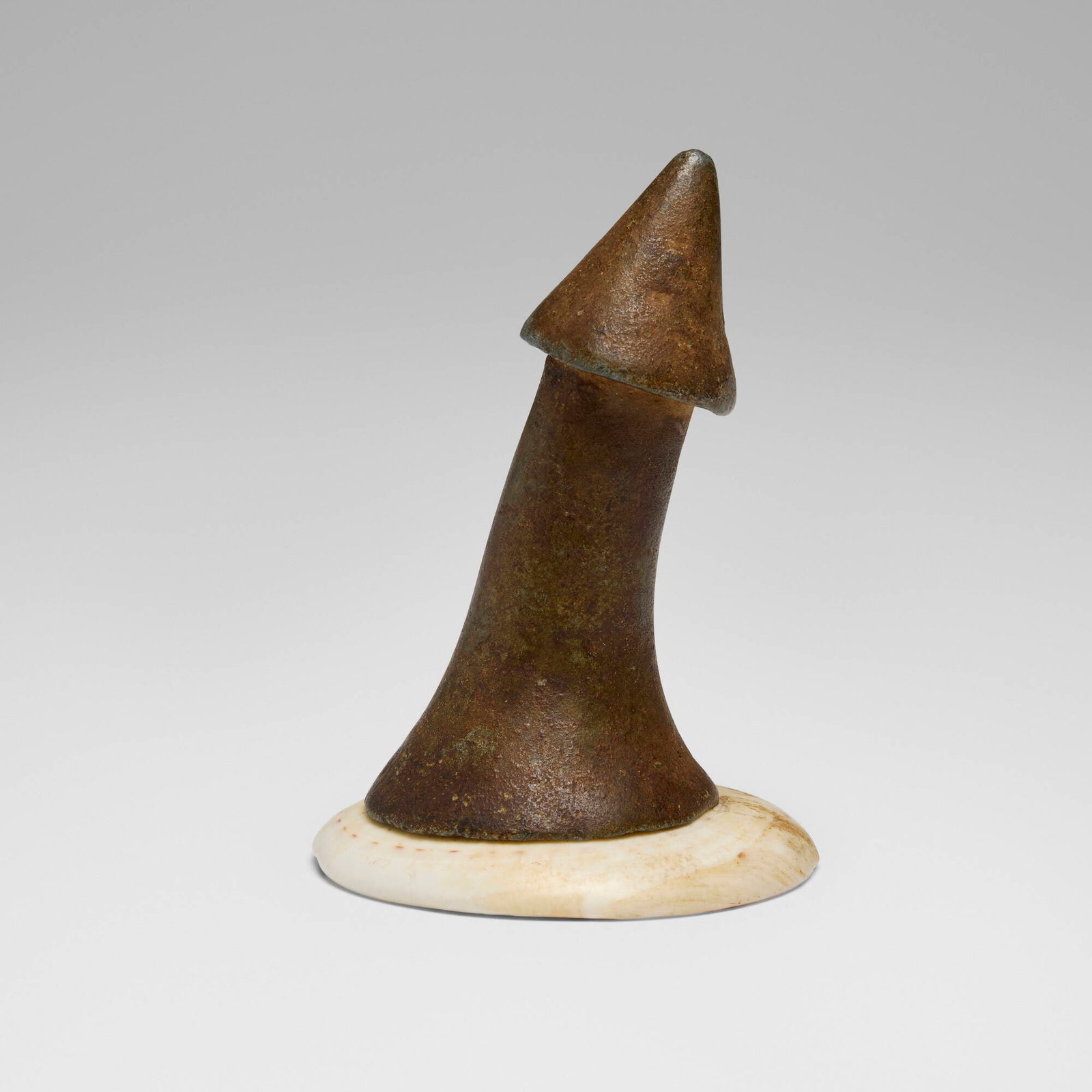 Oromo, Kallacha headpiece: Oromo Kallacha headpiece Ethiopia, 20th century bronze, shell 4 h x 2.5 dia in (10 x 6 cm) Worn primarily by chiefs and high-ranking spiritual mediators, the kallacha served as a powerful symbol of