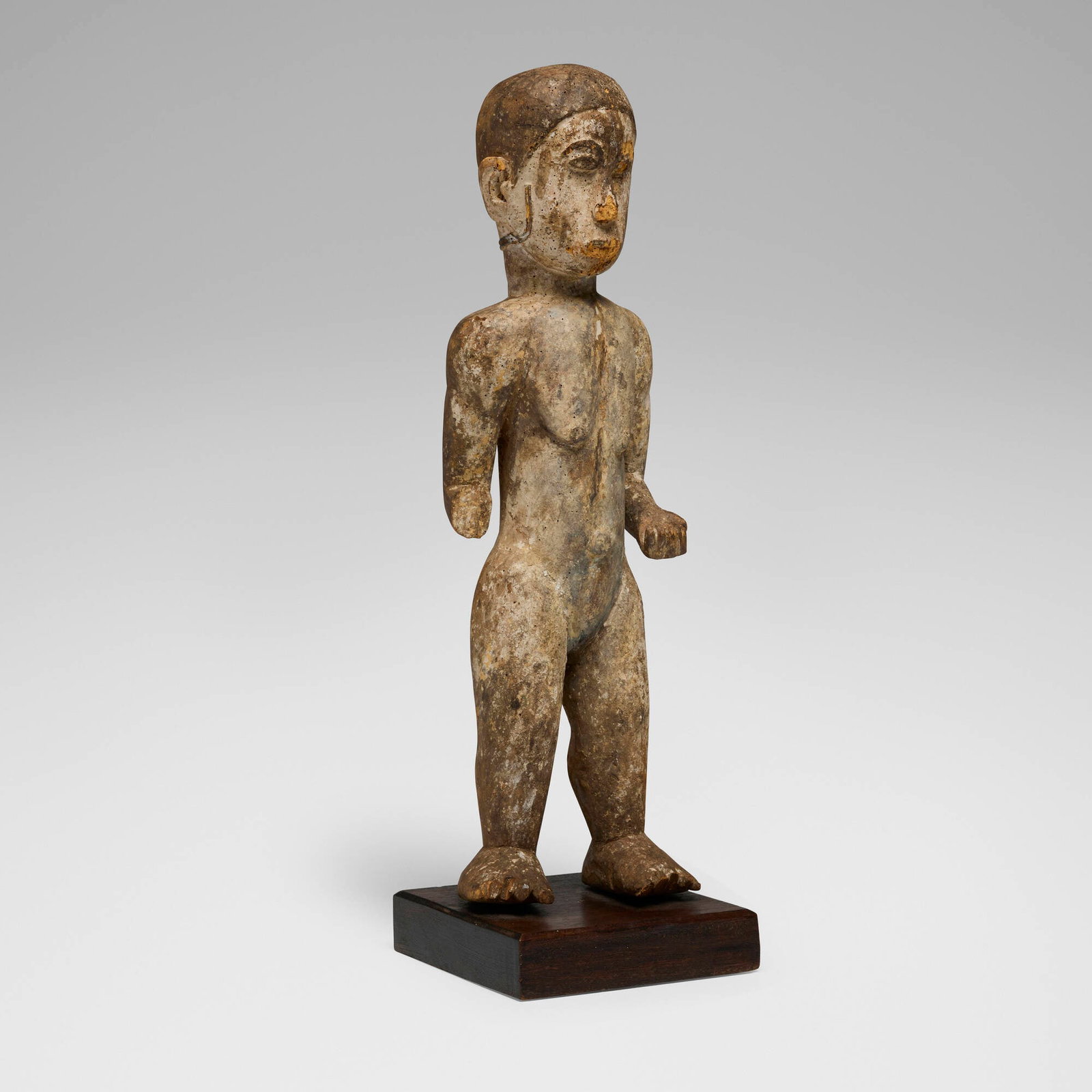 Ibibio, Ekong society marionette: Ibibio Ekong society marionette Nigeria, early 20th century carved wood, kaolin 19.5 h x 6 w x 5.75 d in (50 x 15 x 15 cm) Provenance: Acquired in France, Private Collection, Maryland This work will