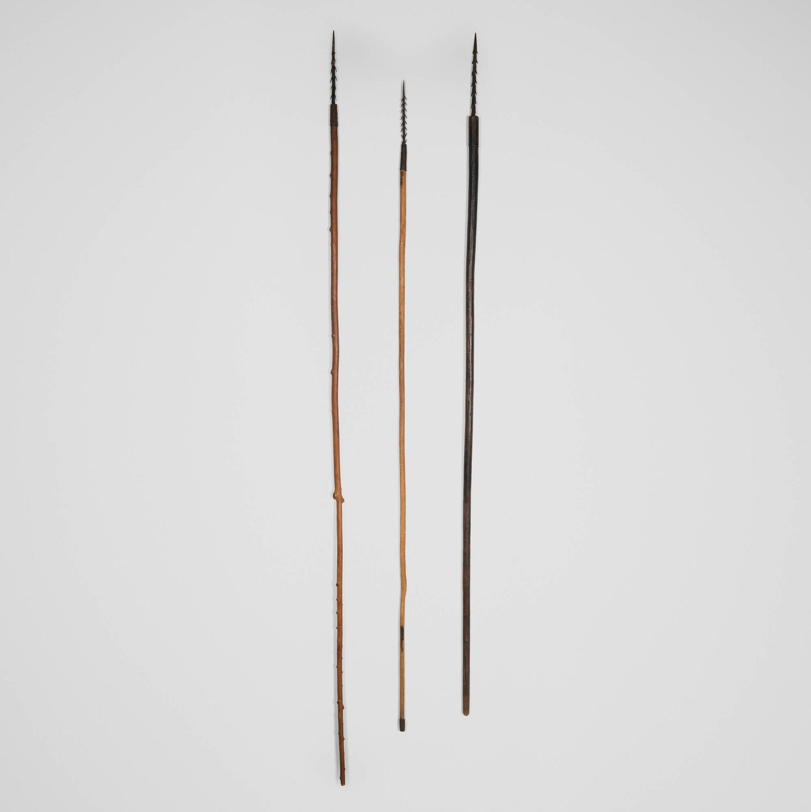 Tonga, Fishing harpoons, set of three: Tonga Fishing harpoons, set of three Middle and upper Zambezi River regions, Zimbabwe, , 20th century carved wood, iron 82.5 h x 1 dia in (210 x 3 cm) 75 h x 1 dia in (190 x 3 cm) 71.5 h x 1 dia