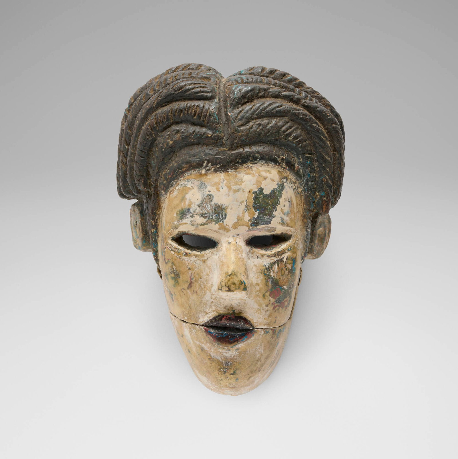 Ibibio, Mask with articulated jaw: Ibibio Mask with articulated jaw Nigeria, 20th century carved and painted wood, string 9 h x 6 w x 3.5 d in (23 x 15 x 9 cm) Provenance: Deborah Stokes and Jeffrey Hammer, Chicago | Private