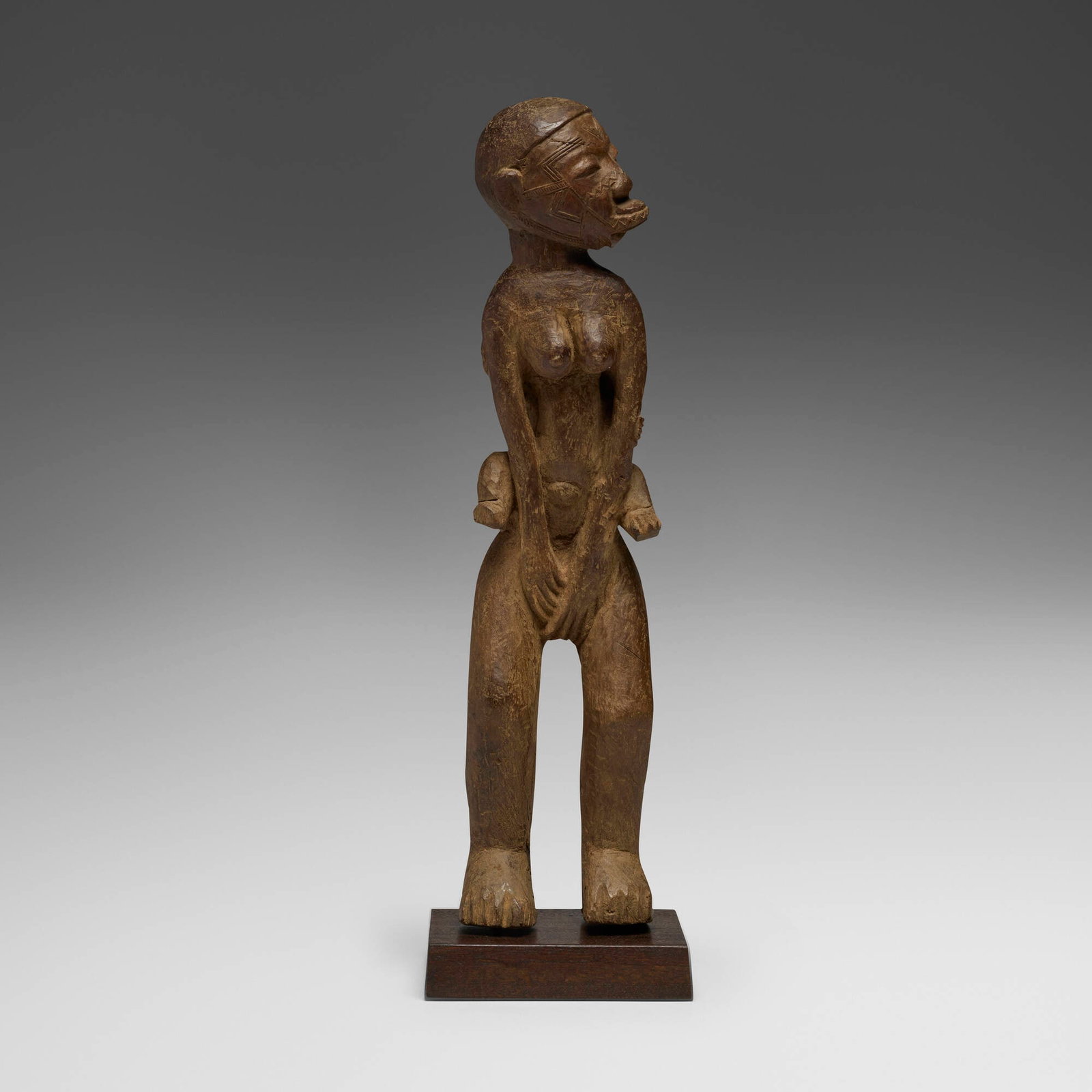Makonde, Maternity figure: Makonde Maternity figure Tanzania, 20th century carved wood 22.5 h x 6.5 w x 5.5 d in (57 x 17 x 14 cm) Field collected by the former owner from an elderly woman named MaMalaba in the village o