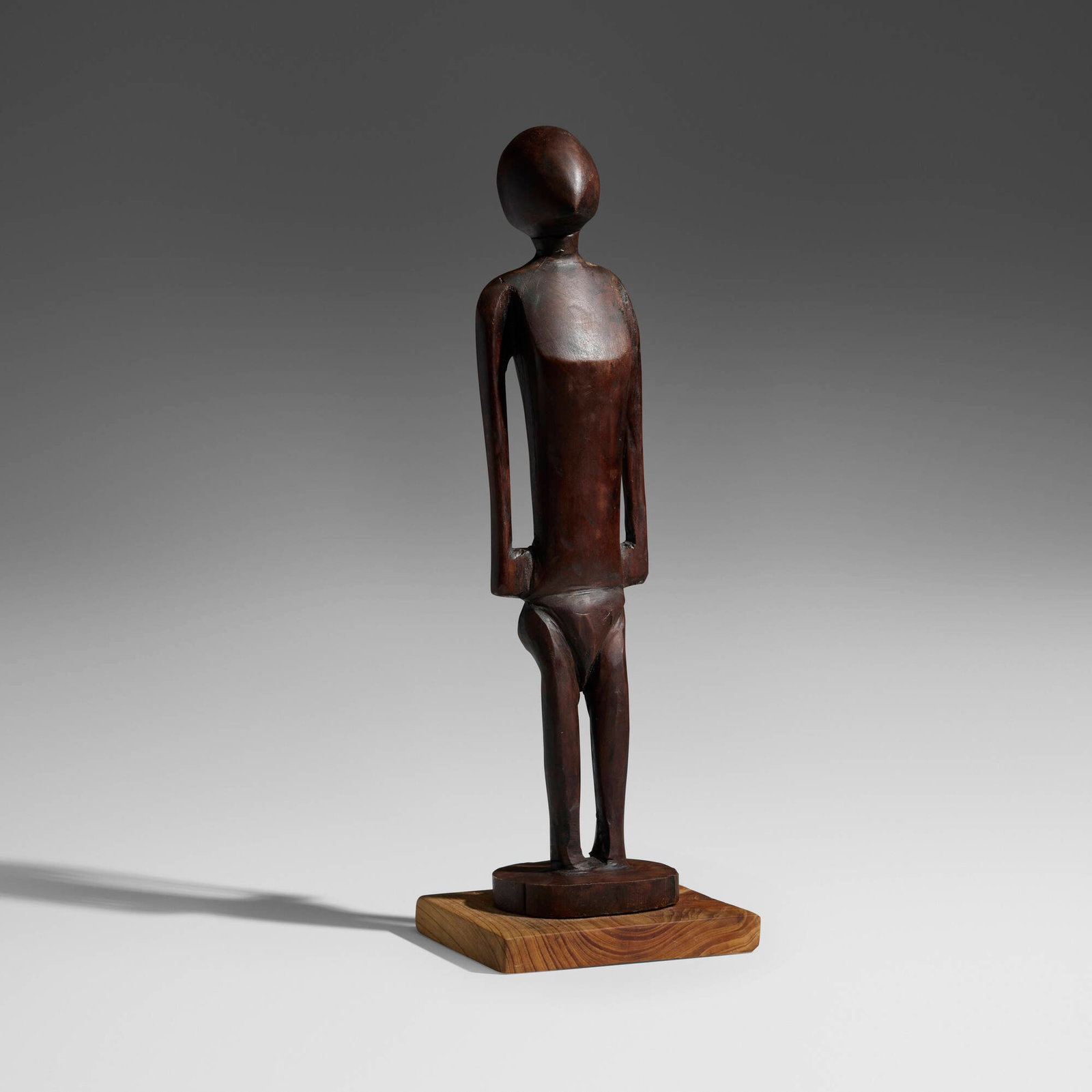 Nukuoro, Dinonga Eidu or Tino deity figure: Nukuoro Dinonga Eidu or Tino deity figure Caroline Islands, mid-20th century carved wood 17.5 h x 6 w x 5 d in (44 x 15 x 13 cm) Provenance: Collected in the 1950s, Private Collection, United States