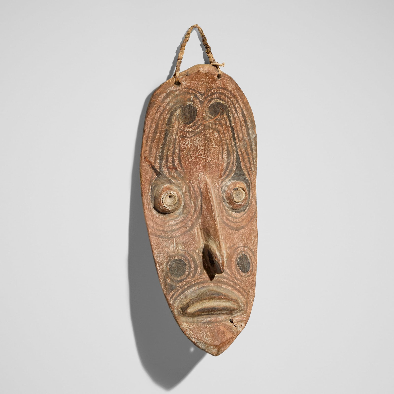 Iatmul, Mask: Iatmul Mask New Guinea, 20th century carved wood, pigment 17 h x 6.75 w x 2.75 d in (43 x 17 x 7 cm) Provenance: Private Collection, California This work wi
