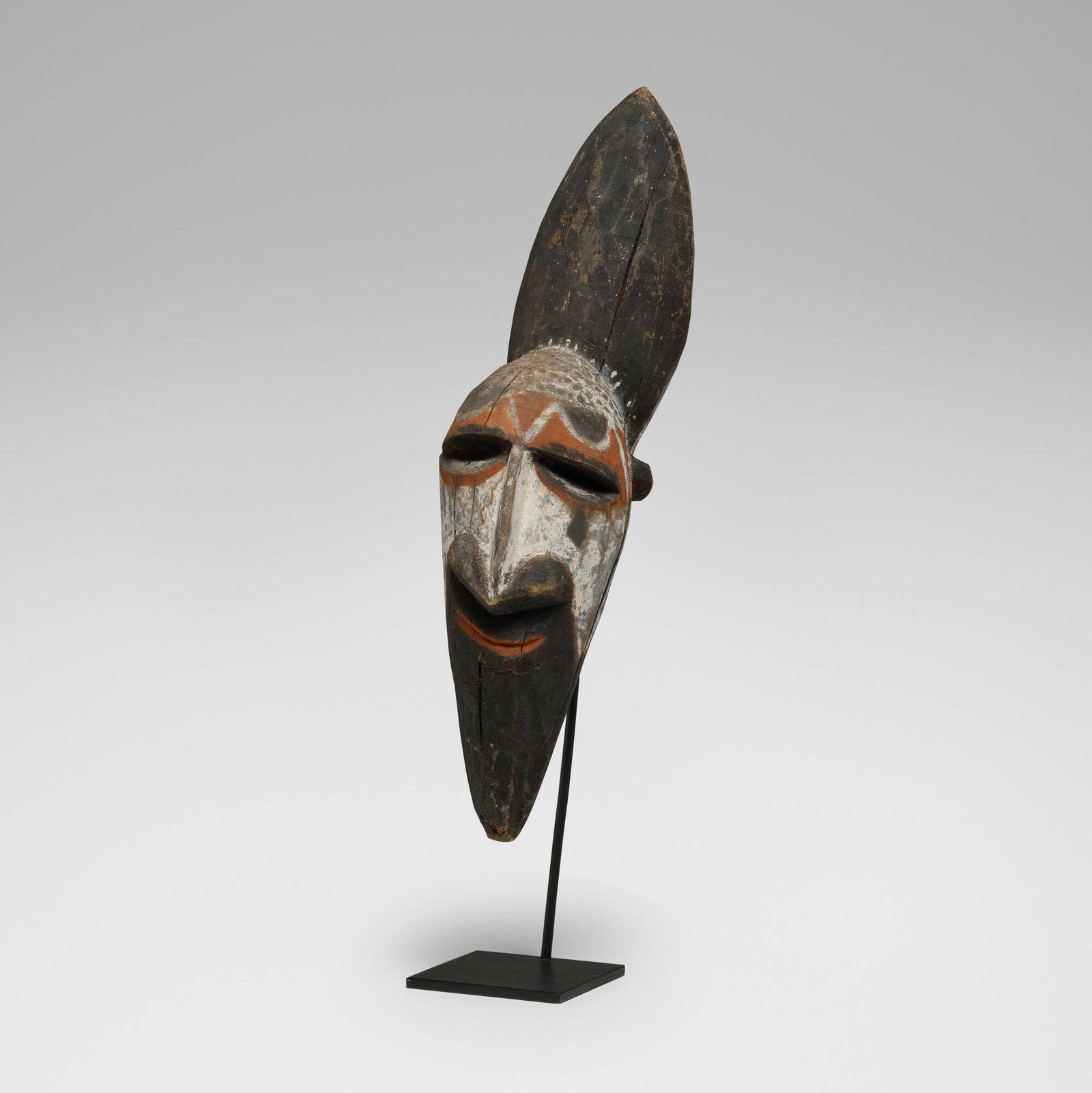 Papuan, Ancestor head: Papuan Ancestor head New Guinea, 20th century carved and painted wood 21.25 h x 5 w x 6 d in (54 x 13 x 15 cm) Provenance: Private Collection, Chicago This work will ship from Chicago, Illinois.