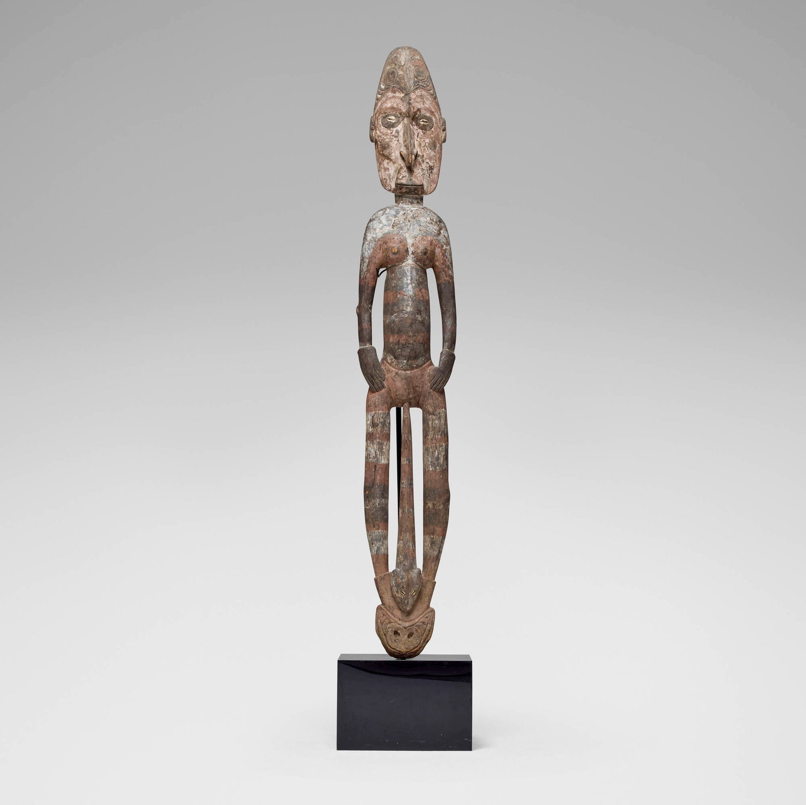 Sepik River, Ancestor figure: Sepik River Ancestor figure Papua New Guinea, early to mid-20th century carved and painted wood, shells 56.5 h x 9 w x 3.75 d in (144 x 23 x 10 cm) Provenance: Private Collecti