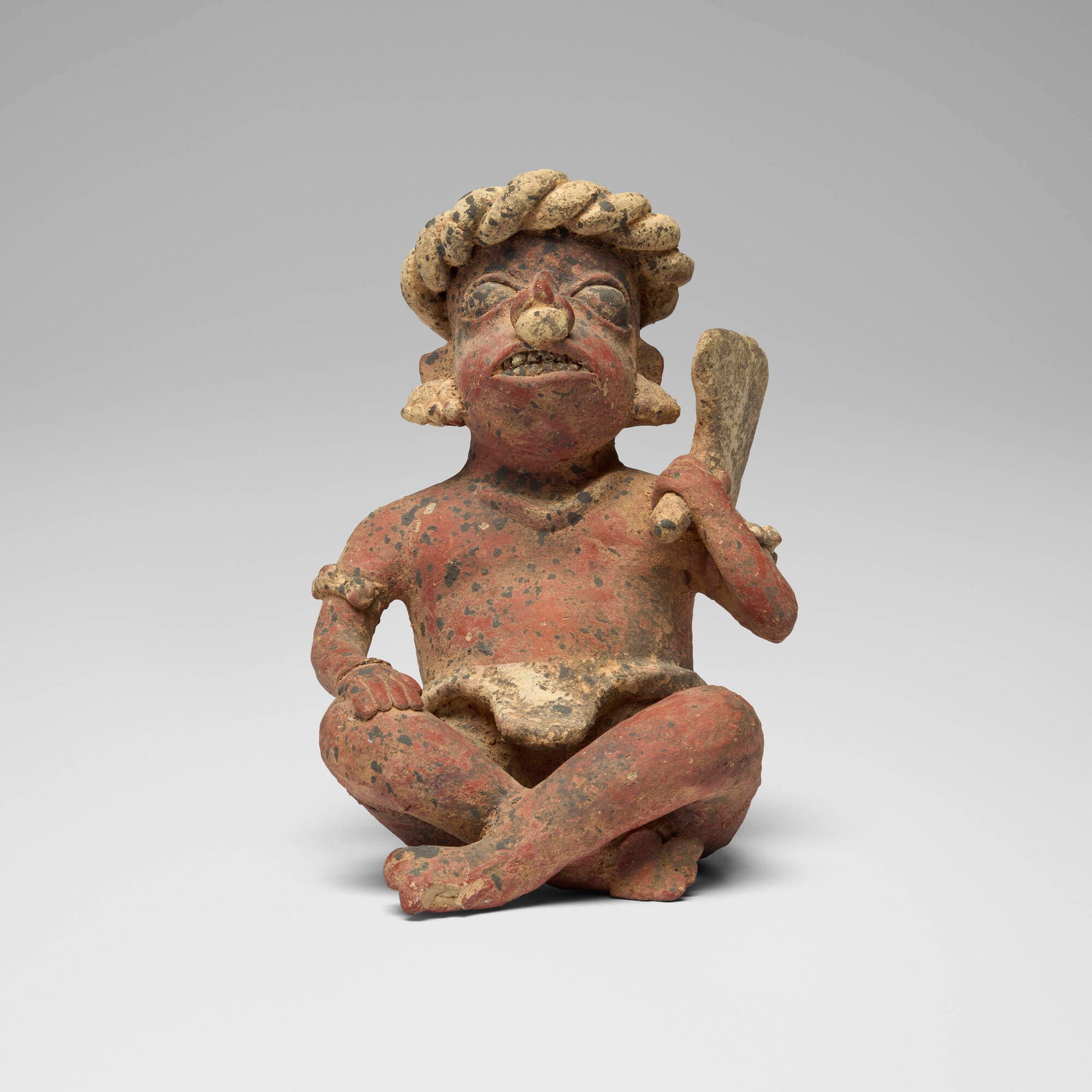 Nayarit, Seated warrior: Nayarit Seated warrior Mexico, Protoclassic, c. 100 BCE-250 CE painted earthenware 7.875 h x 5.5 w x 6 d in (20 x 14 x 15 cm) Sold with a digital copy of the original invoice from Bernheimers Antique