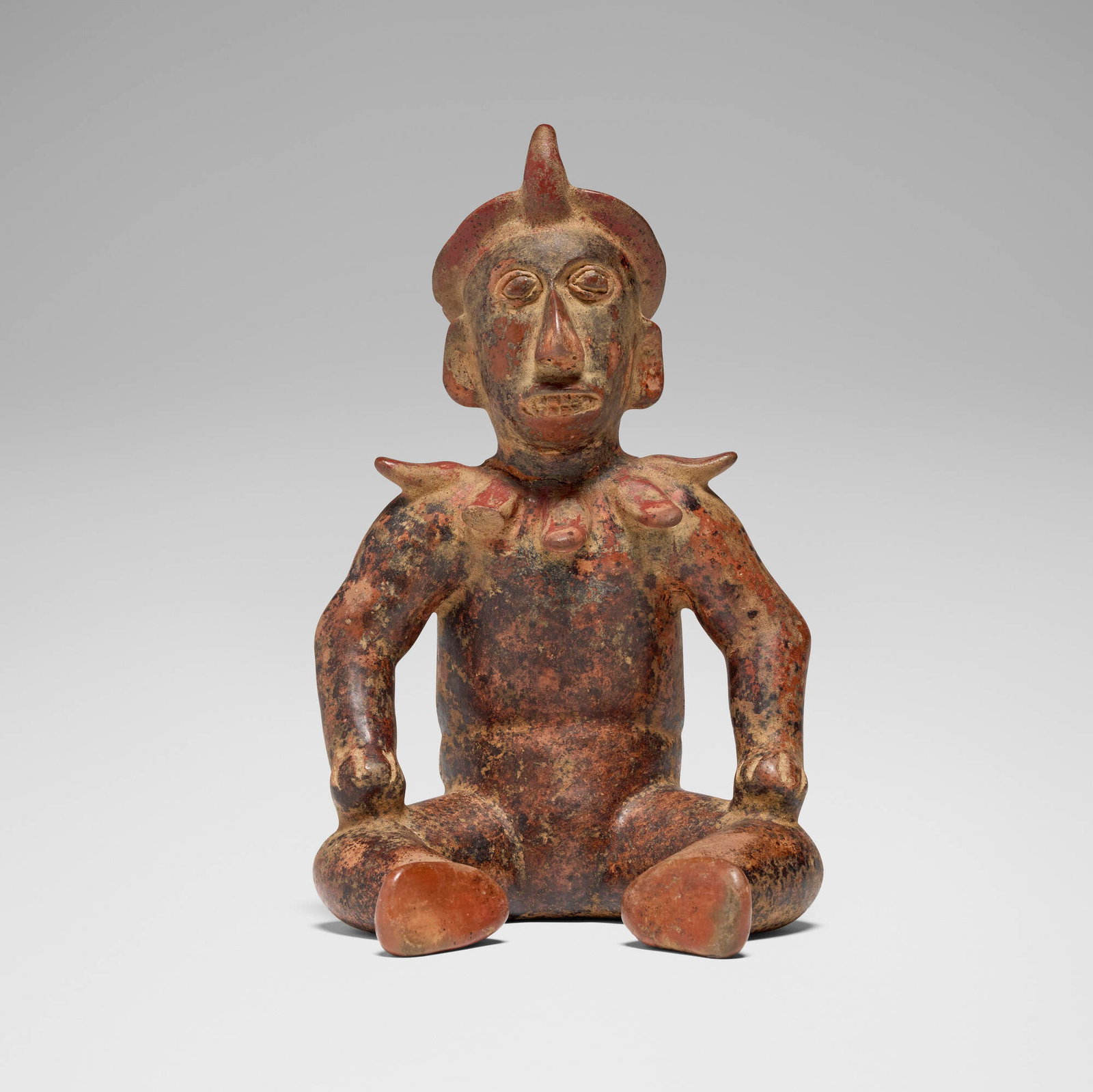 Colima, Seated shaman: Colima Seated shaman West Mexico, Protoclassic, c. 100 BCE - 250 CE earthenware 12.875 h x 8.5 w x 8 d in (33 x 22 x 20 cm) Provenance: Private Collection, San Marino, CA This work will ship from Los