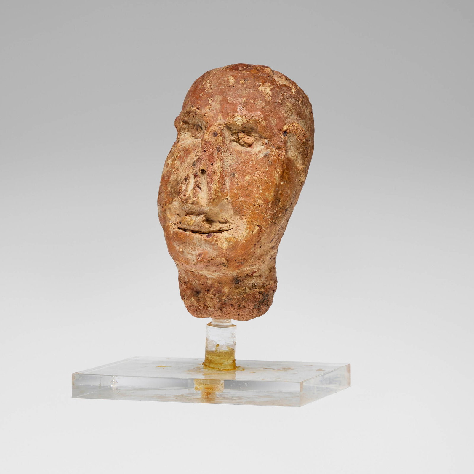 Ancient Greek, Votive head: Ancient Greek Votive head Greece, c. 3rd-1st century BCE terracotta 6.75 h x 4.75 w x 3.5 d in (17 x 12 x 9 cm) Provenance: Private Collection, California This work will ship from Los Angeles,