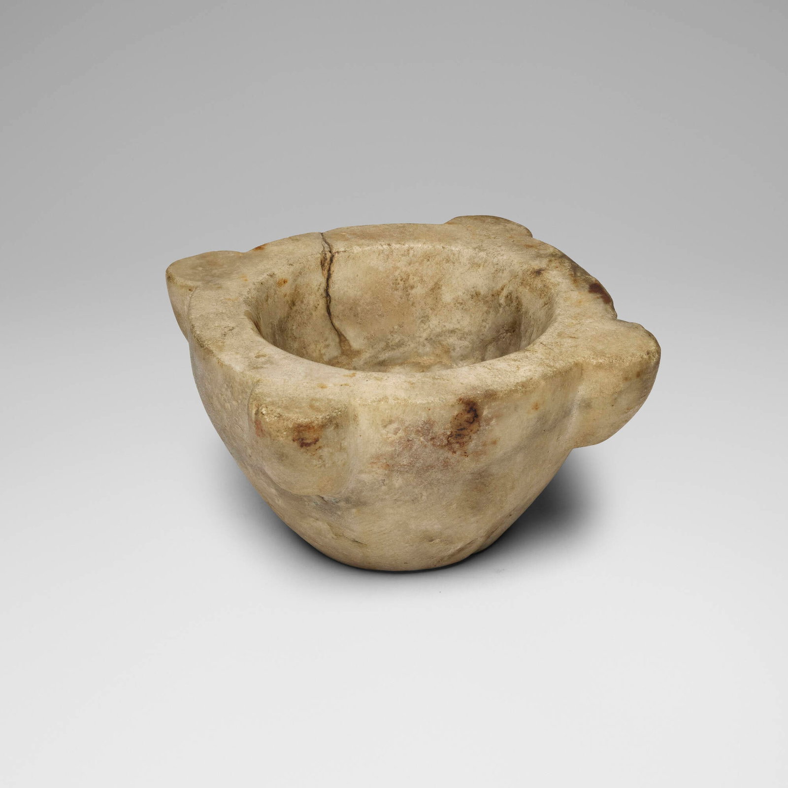 Mediterranean or Near Eastern, Mortar: Mediterranean or Near Eastern Mortar stone 4.5 h x 10 dia in (11 x 25 cm) Provenance: Estate of Paul A. Cohen, Massachusetts This work will ship from Lambertville, New Jersey.