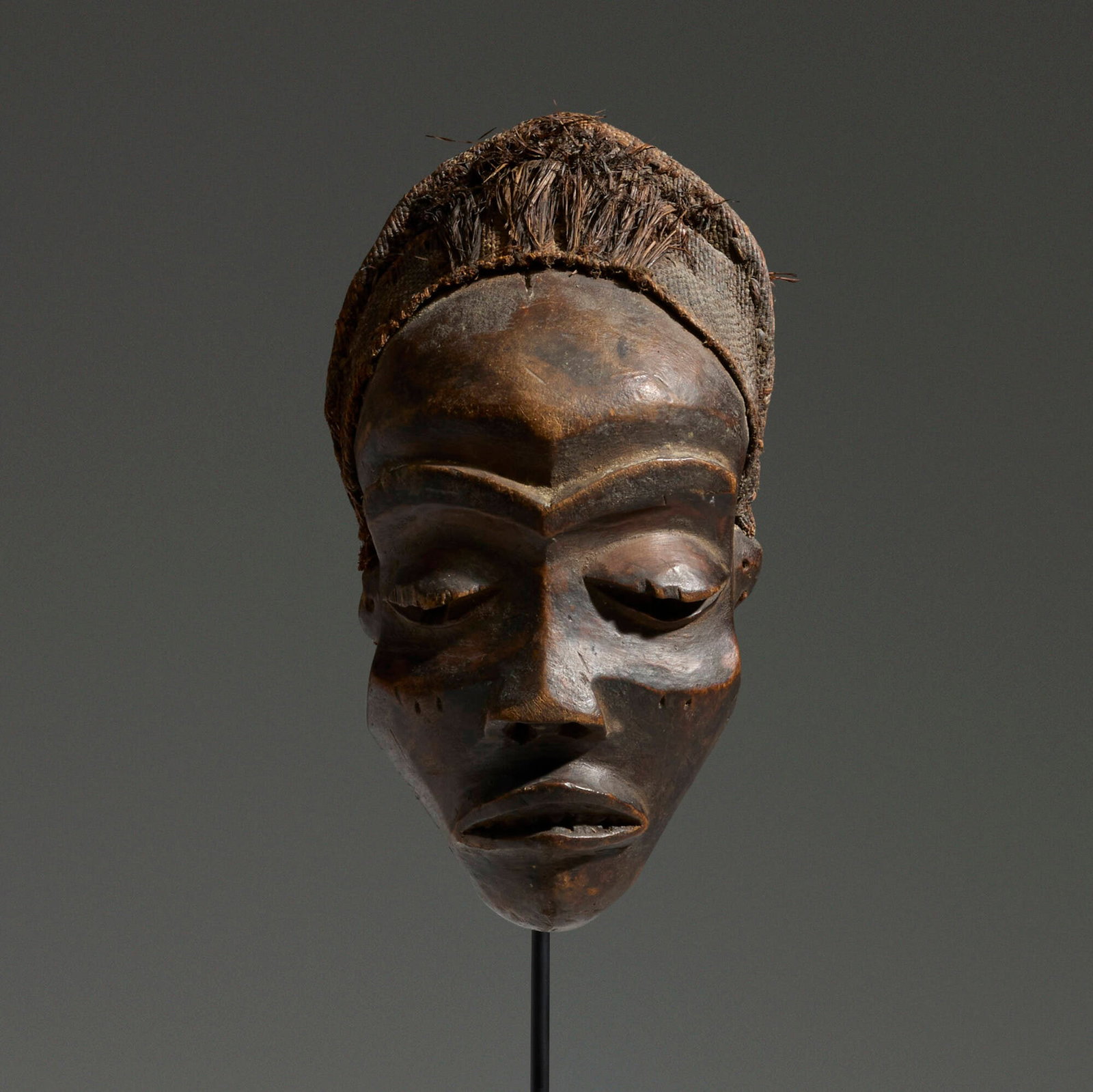 Chokwe, Mask: Chokwe Mask Angola, 20th century carved wood, raffia, cord 8 h x 4 w x 2.5 d in (20 x 10 x 6 cm) This work will ship from Chicago, Illinois.