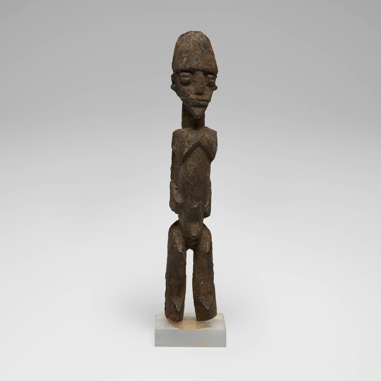 Lobi, Bateba (figure): Lobi Bateba (figure) Ghana, 20th century carved wood with encrustation 13.25 h x 3 w x 3 d in (34 x 8 x 8 cm) Provenance: Private Collection, Maryland This work will ship from Chicago, Illinois.
