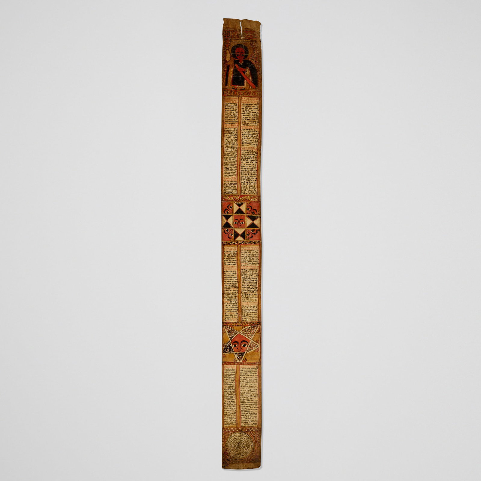 Ethiopian, Talsam or ya b?rana k?tab (healing scroll): Ethiopian Talsam or ya b?rana k?tab (healing scroll) late 19th-early 20th century ink and pigment on parchment and cotton 65.375 h x 5 w in (166 x 13 cm) This Ethiopian talsam, or ya b?ranna k?tab