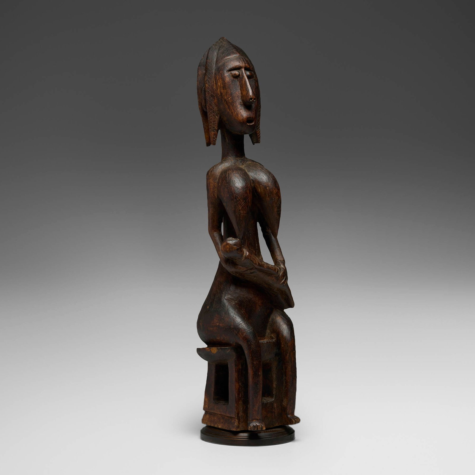 Bamana, Fertility figure: Bamana Fertility figure Mali, 20th century carved wood 29 h x 8 w x 6.5 d in (74 x 20 x 17 cm) Provenance: Private Collection, Maryland This work will ship from Chicago, Illinois.