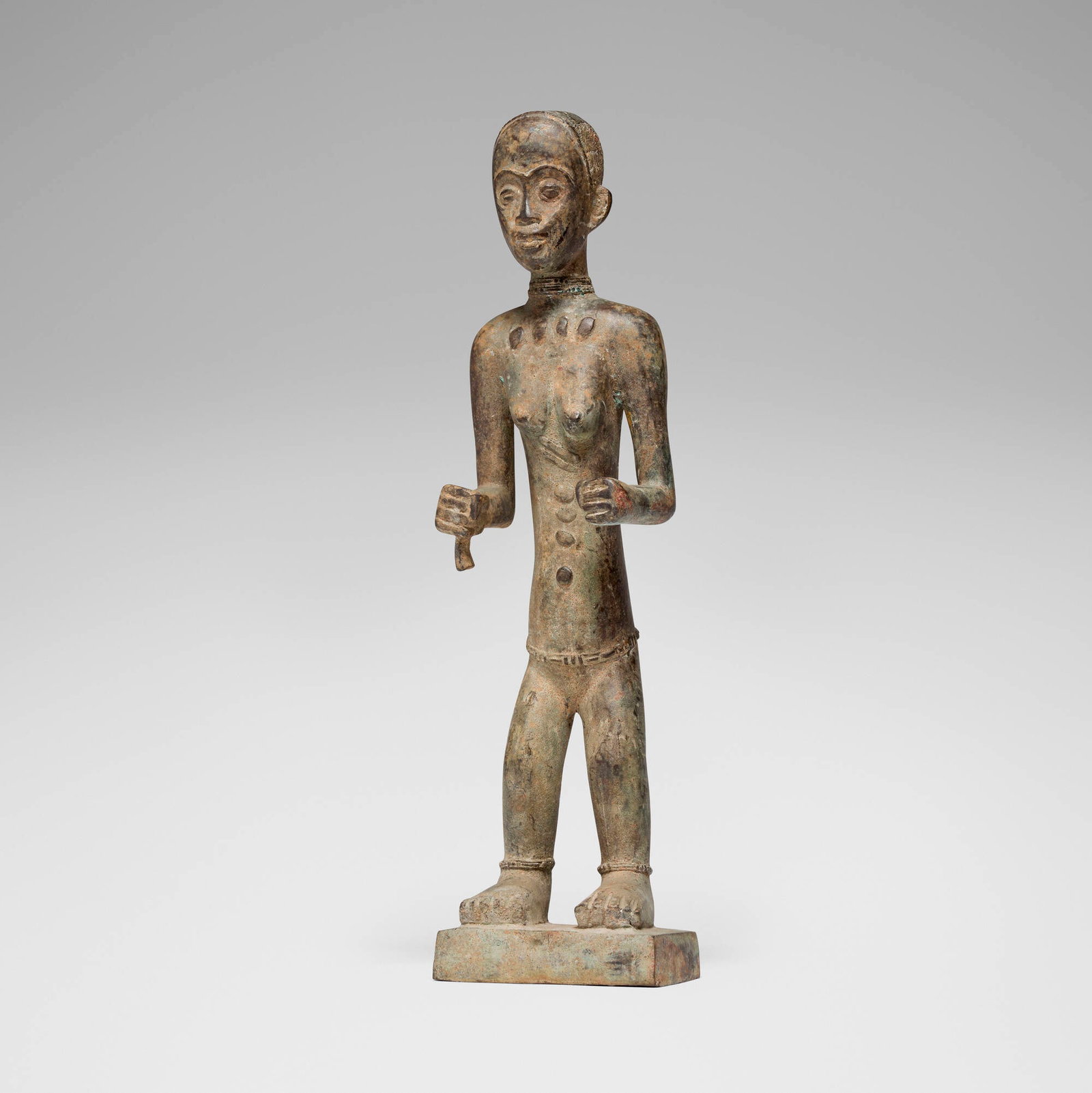 West African, Standing female figure: West African Standing female figure 20th century bronze 21 h x 5.5 w x 3.5 d in (53 x 14 x 9 cm) This work will ship from Los Angeles, California.