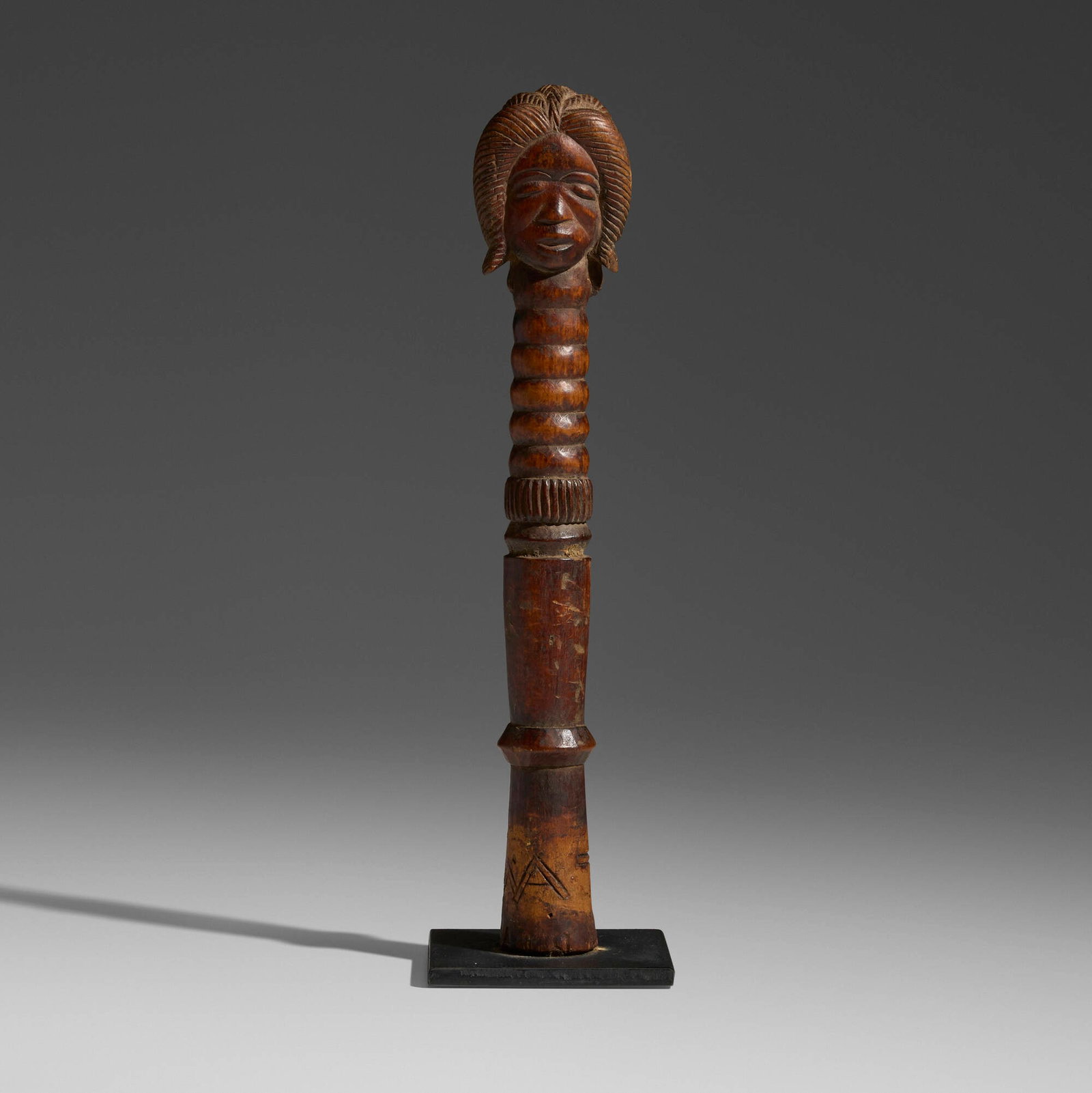 Ovimbundu , Prestige staff: Ovimbundu Prestige staff Angola, 20th century carved wood 11.75 h x 3 w x 3 d in (30 x 8 x 8 cm) Provenance: Private Collection, Maryland This work will ship from Chicago, Illinois.